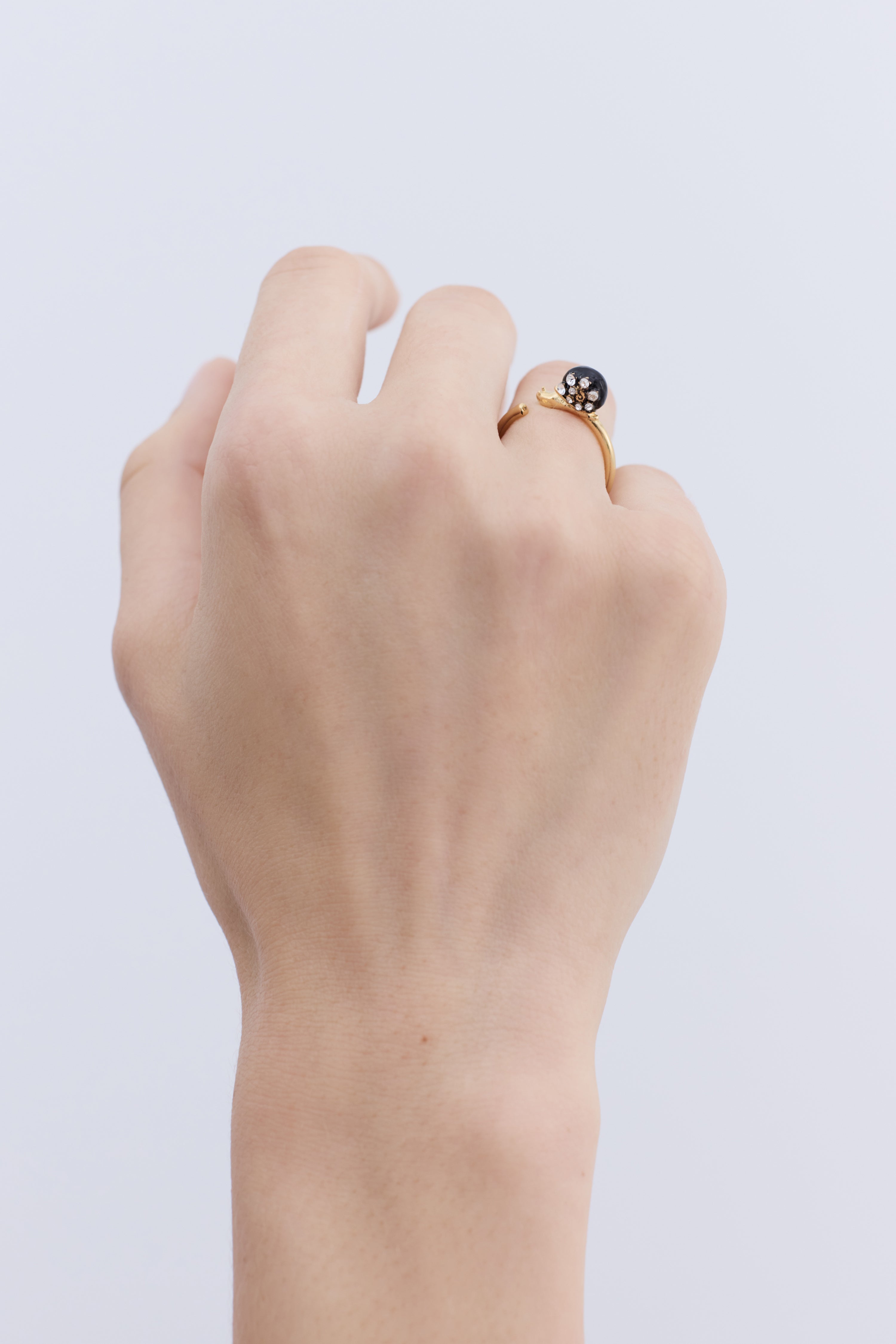 Black and gold snail adjustable ring with crystals