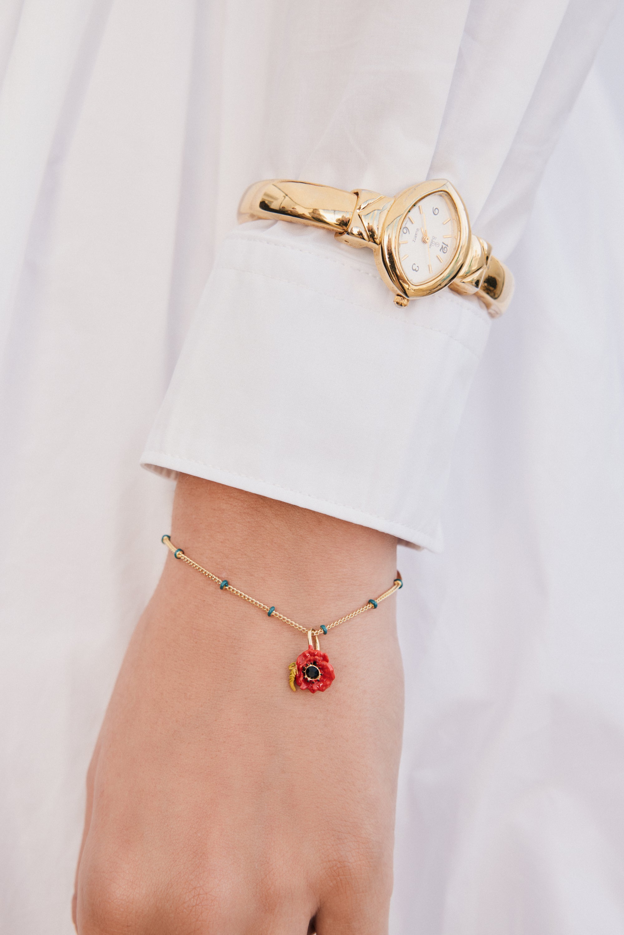 Fine bracelet with red poppy and black crystal