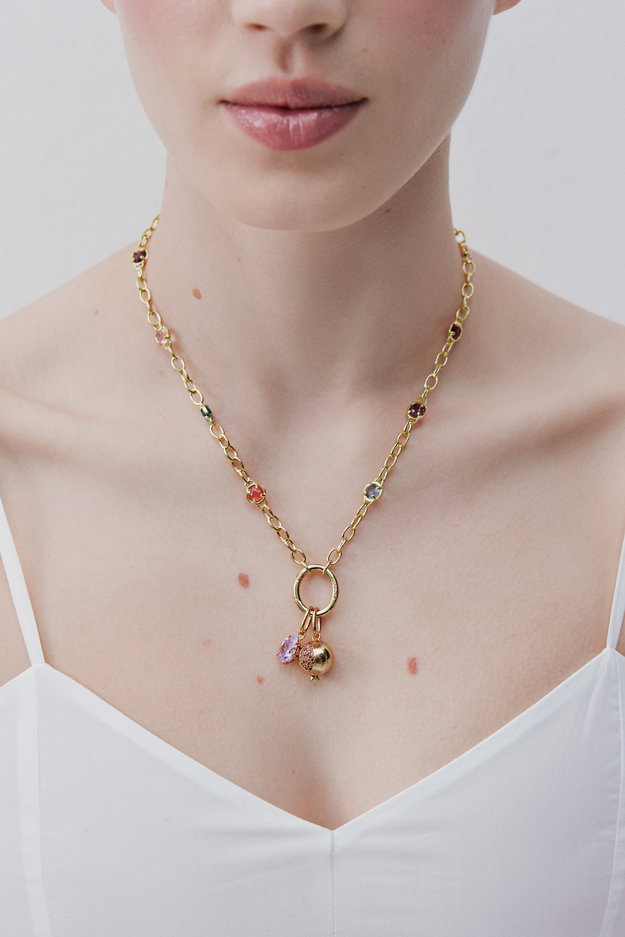 Golden pomegranate pendant, Eros and Prodigality