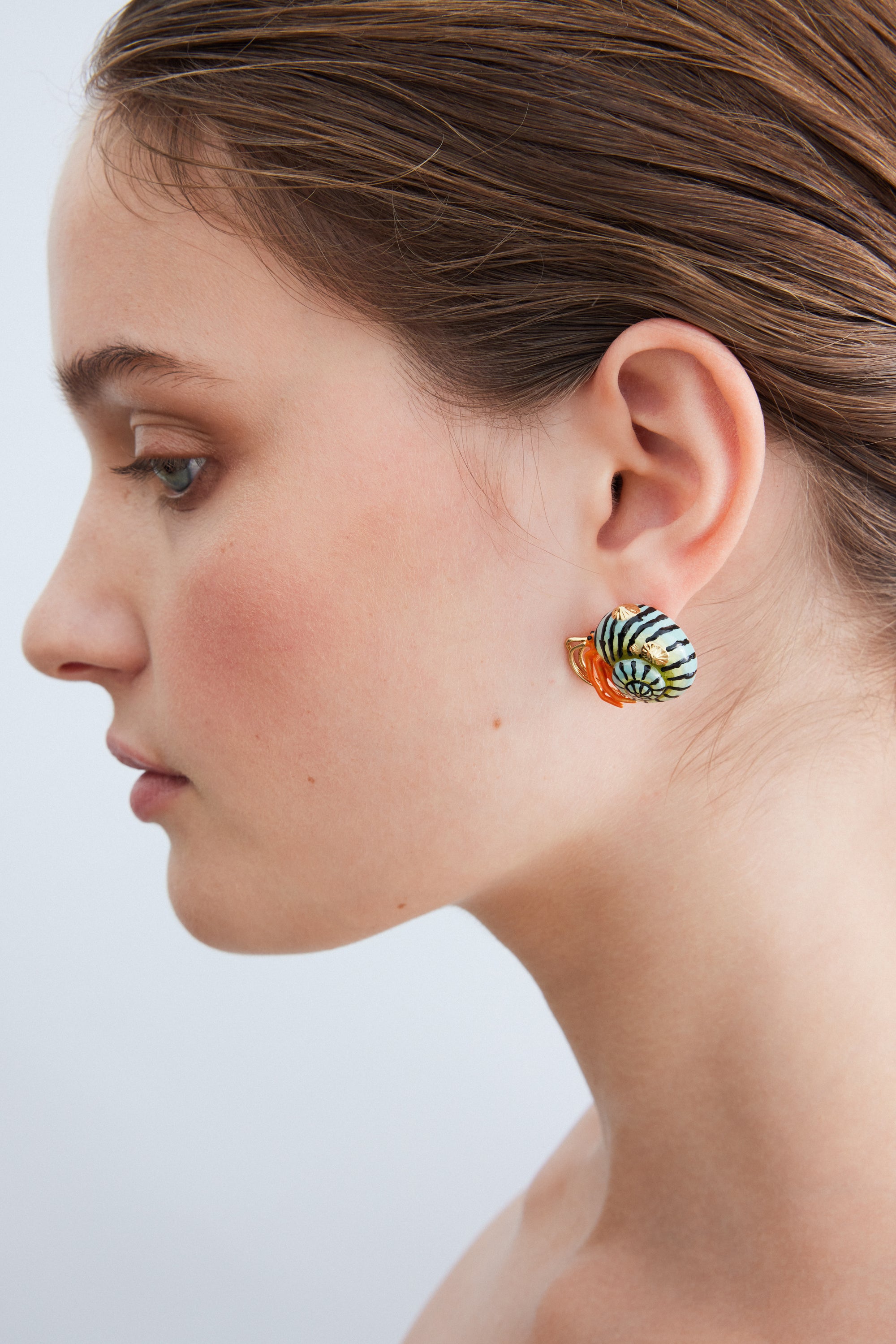 Green and orange hermit crab earrings