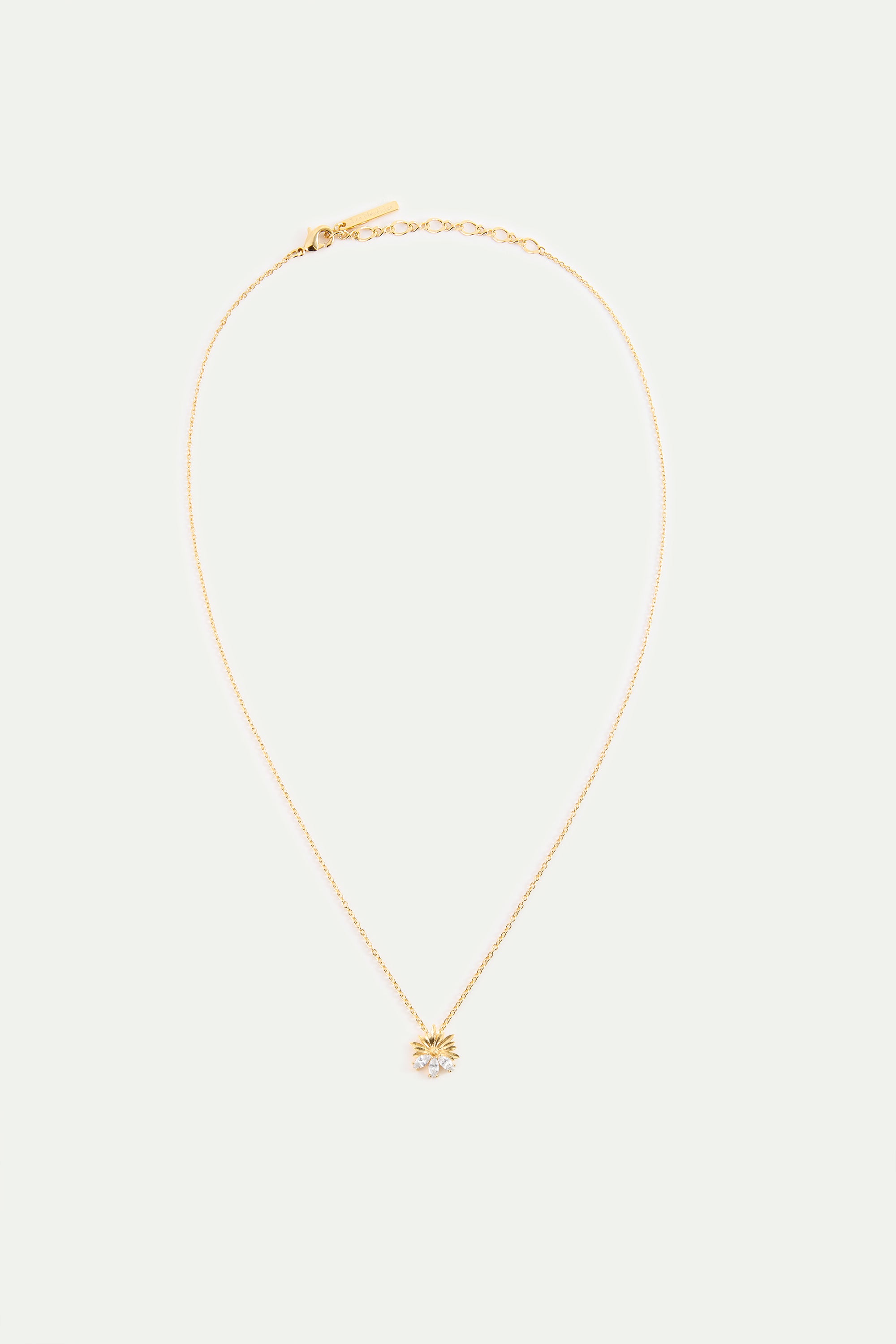 Gold pendant necklace with daisies and white stones