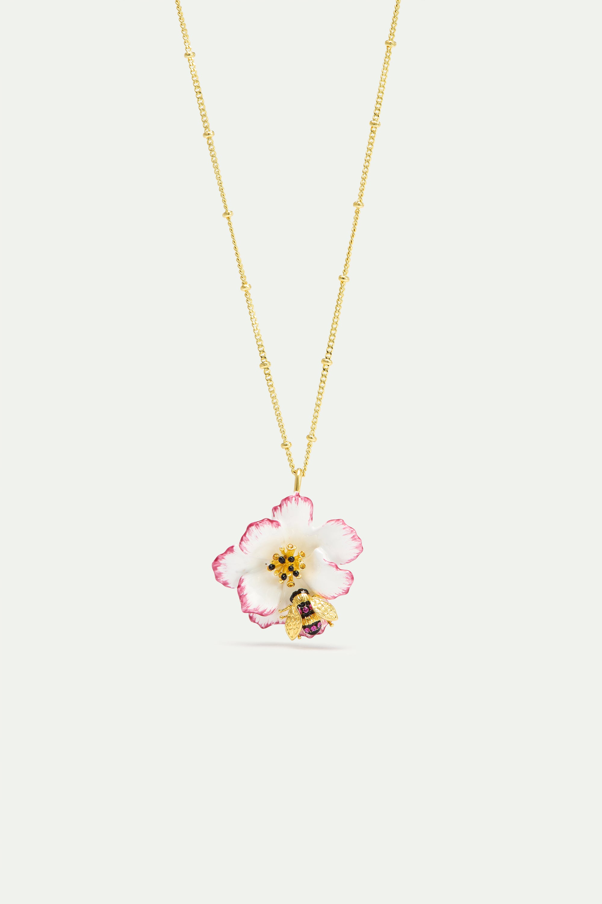 Pendant necklace with white and pink cosmos flower and gold bee