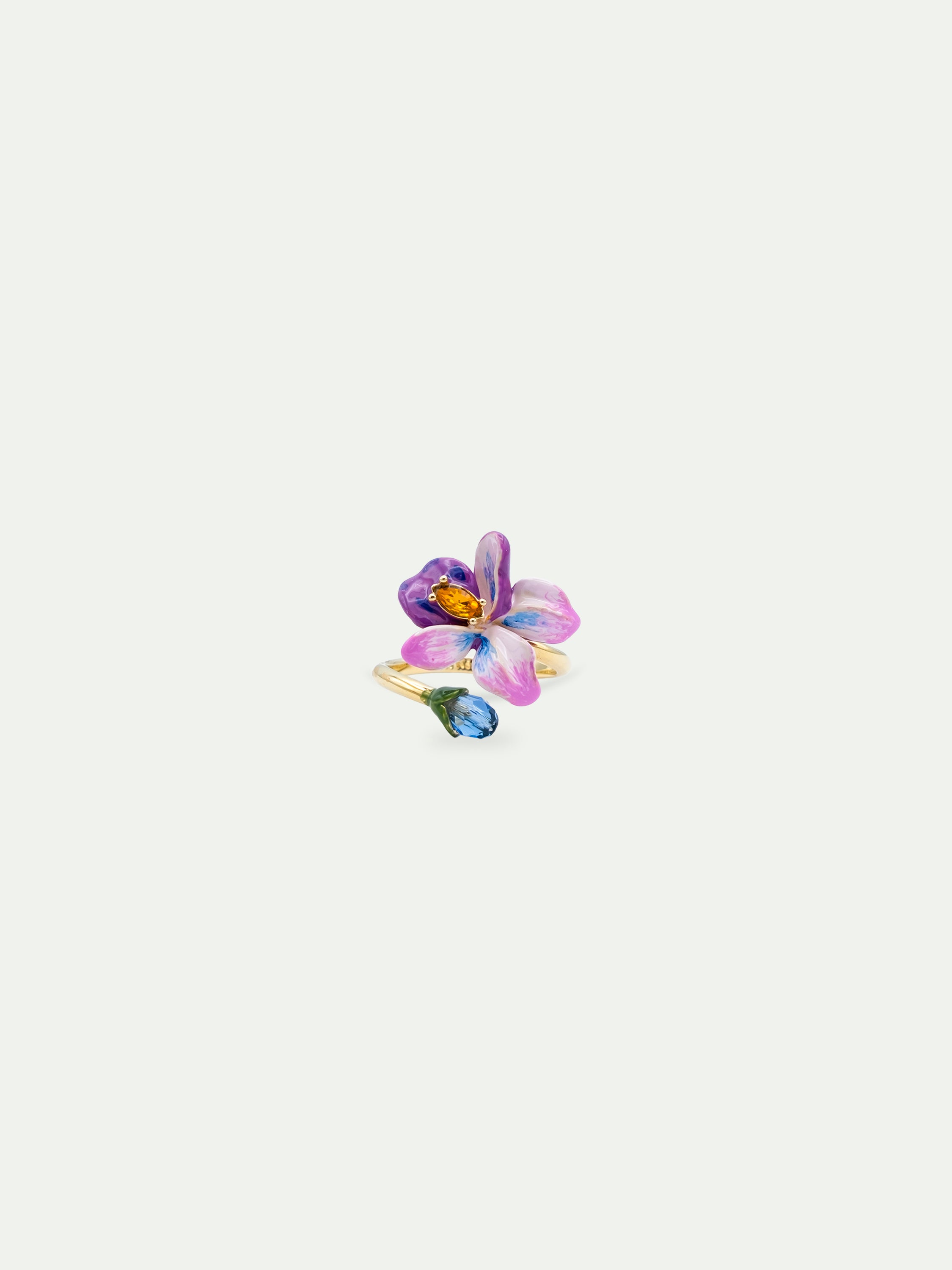 Adjustable ring with violet flower and blue cut stone