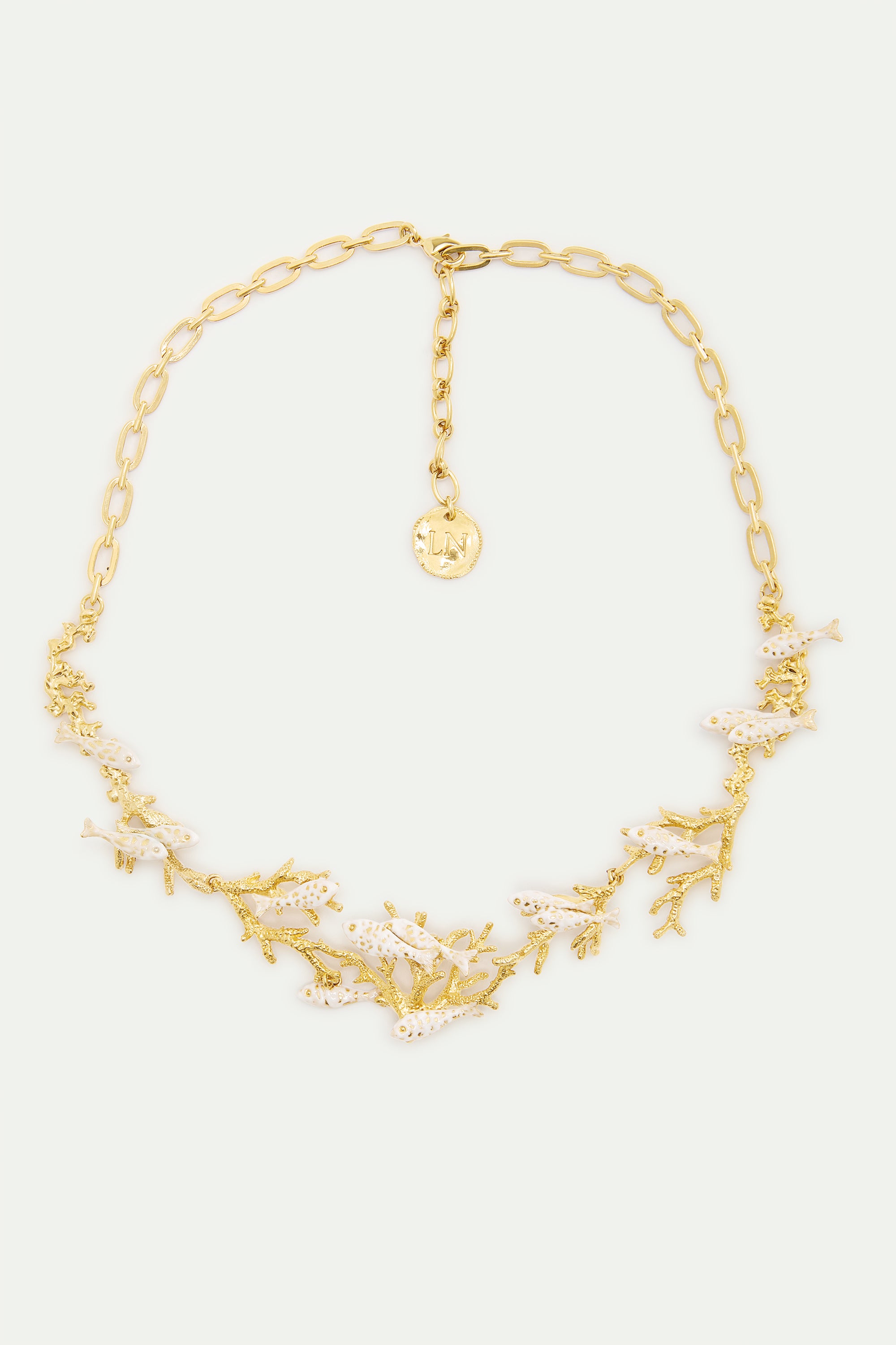 Golden coral and white fish statement necklace