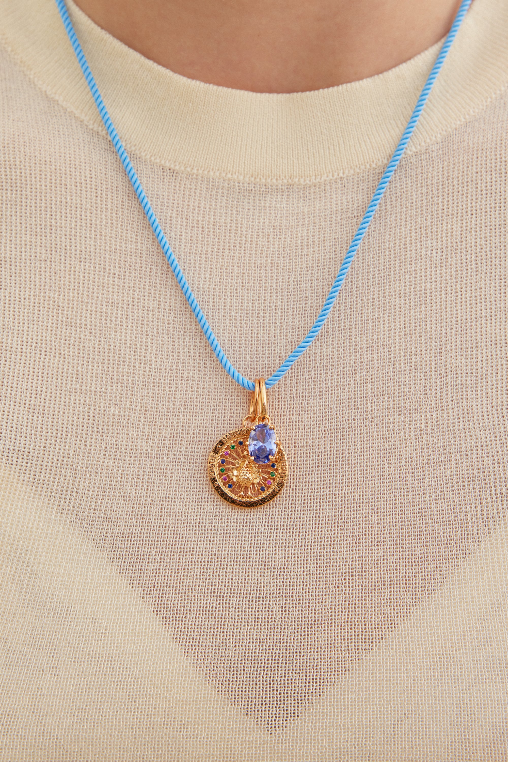 Peacock pendant, vigour and balance