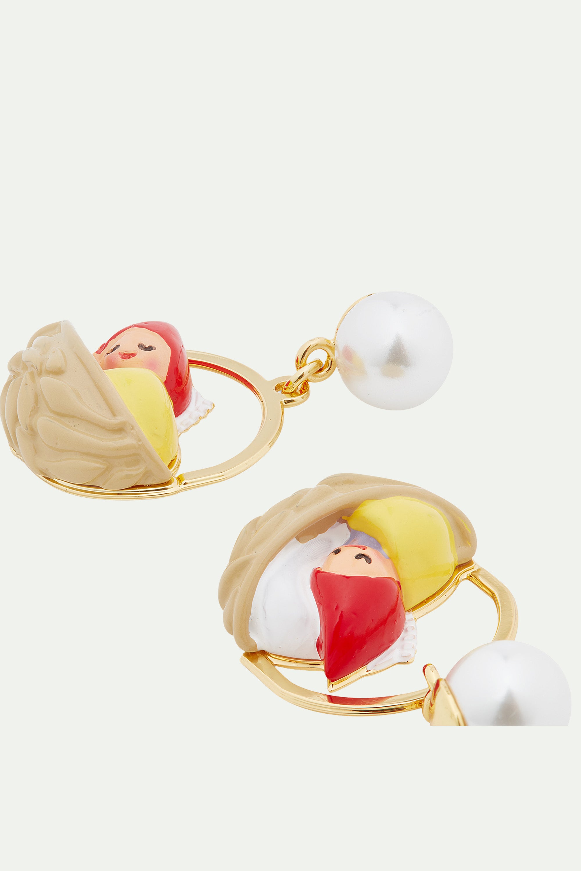 Walnut shell and garden gnome clip-on earrings