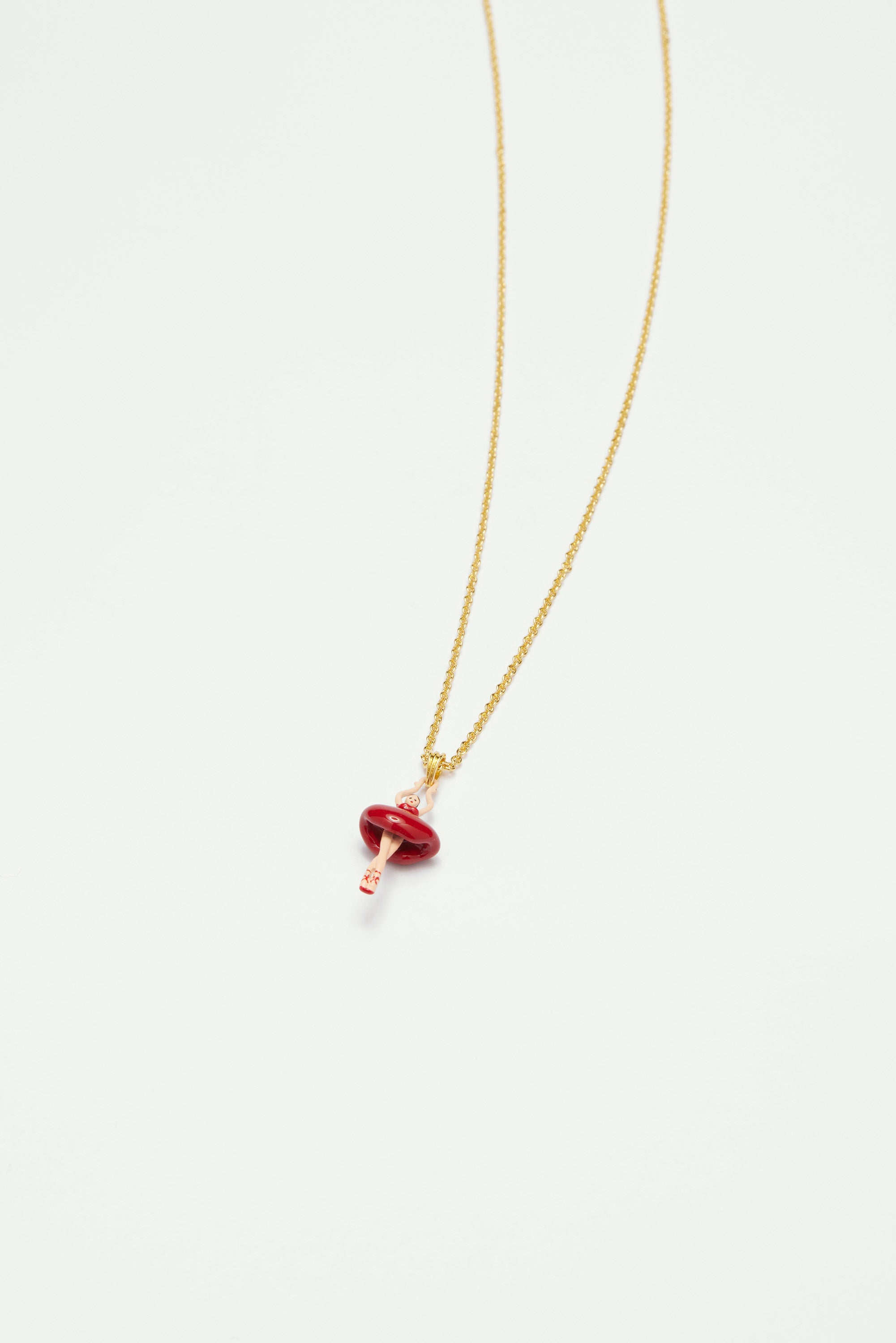 Necklace featuring mini ballerina in a red tutu