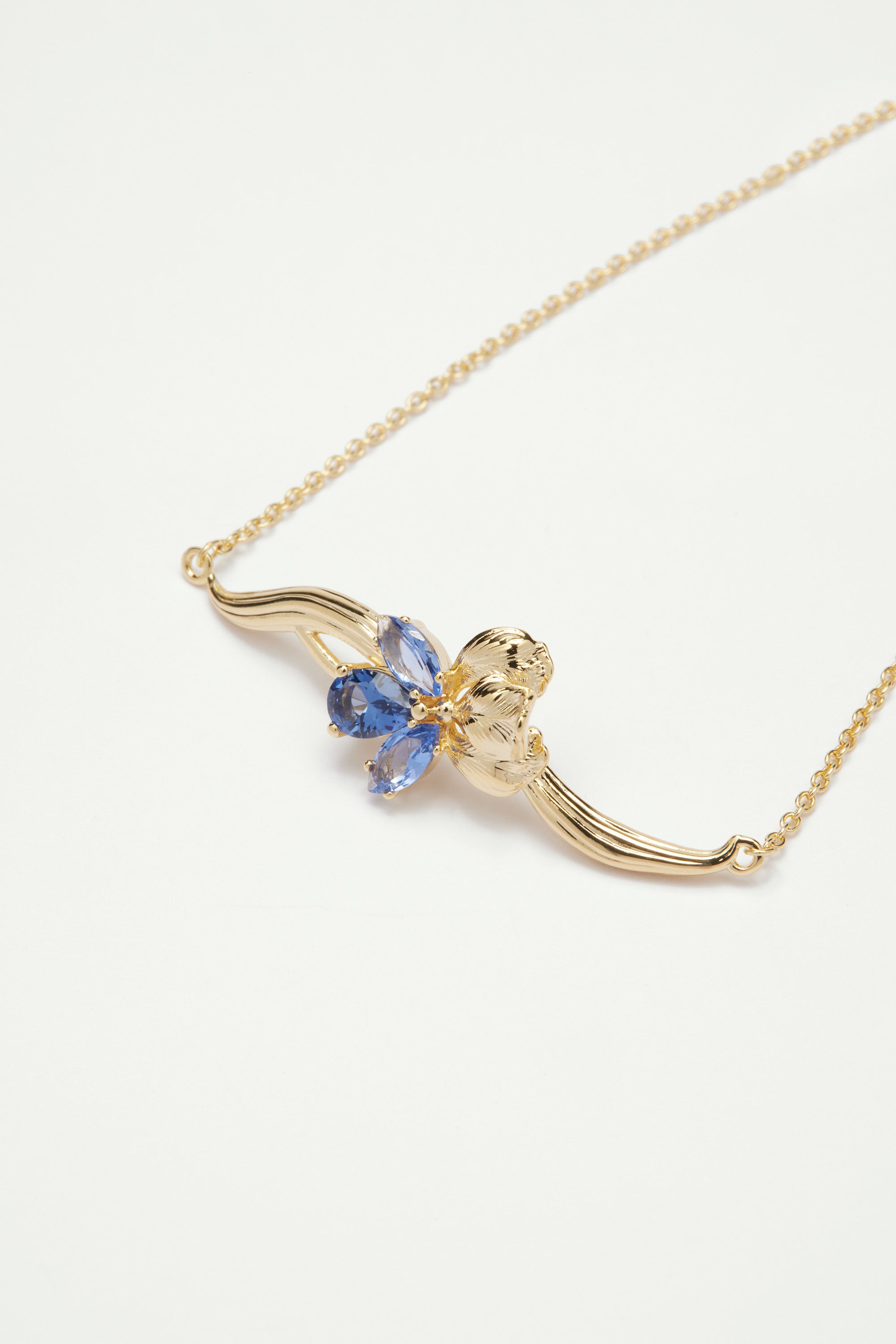 Gold iris and blue crystal fine bracelet