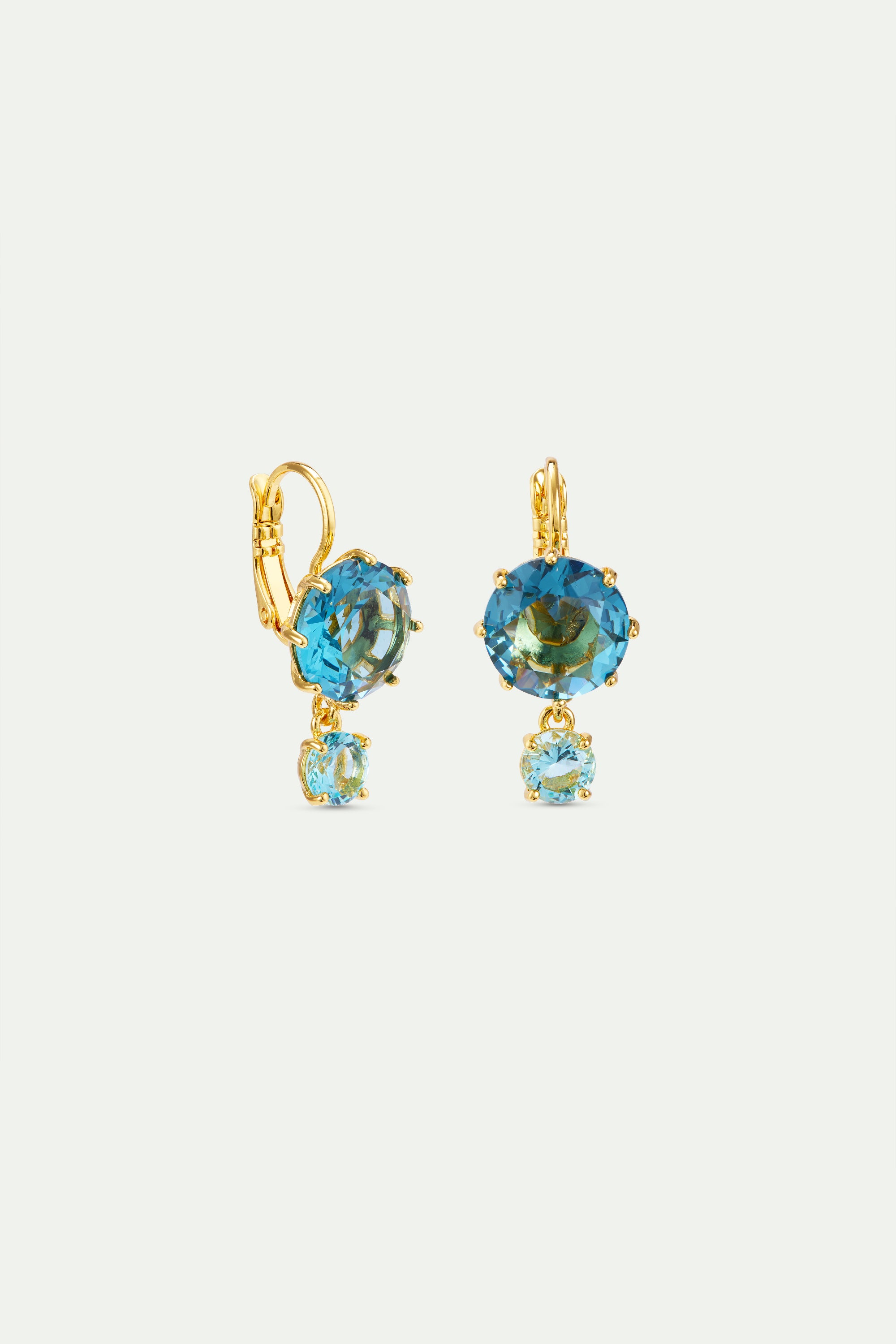 Diamantine sleeper earrings with round acqua azzura stones