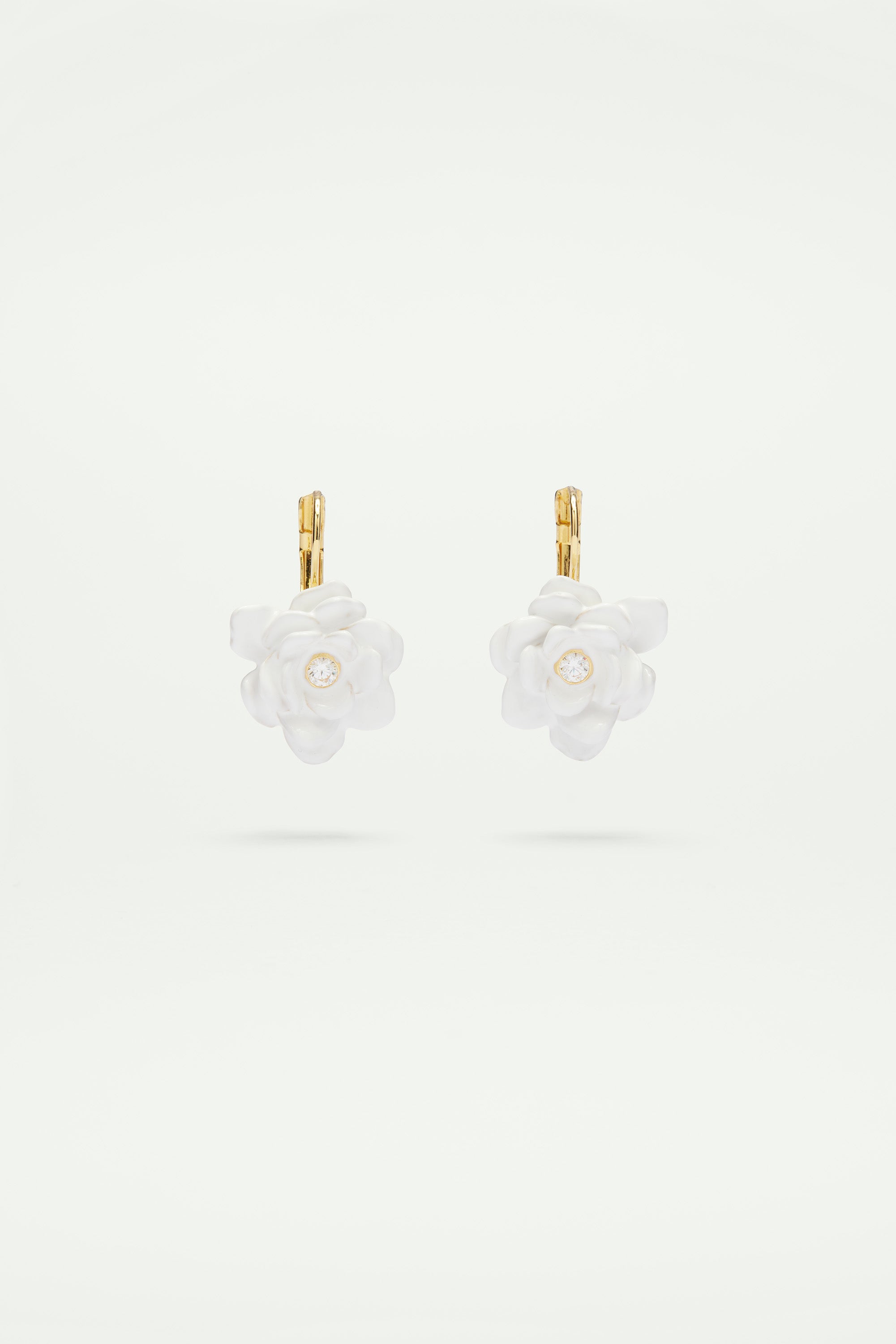 Gardenia and cut stone sleeper earrings