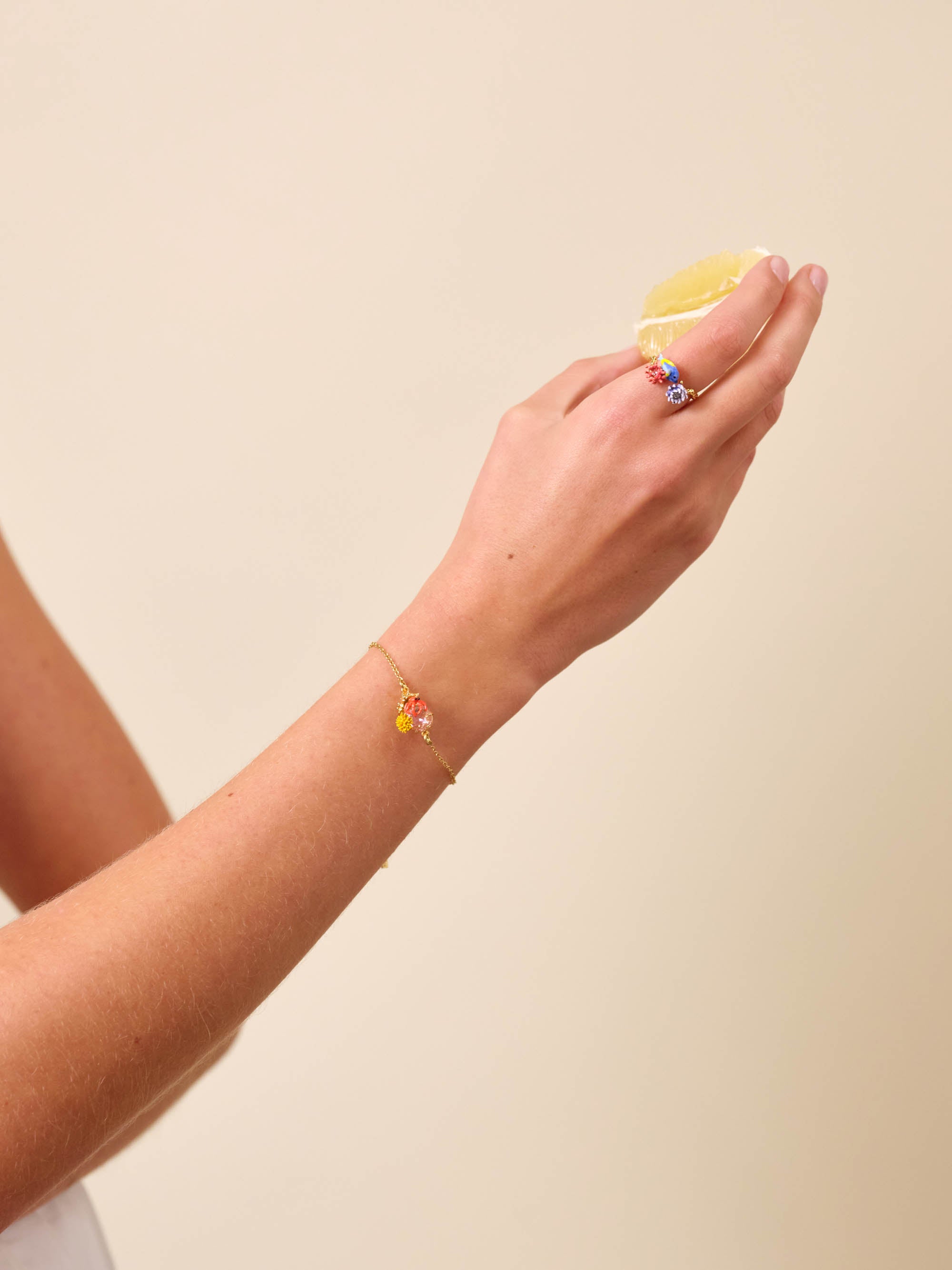 Seashell, enamelled coral and cut glass stone fine bracelet