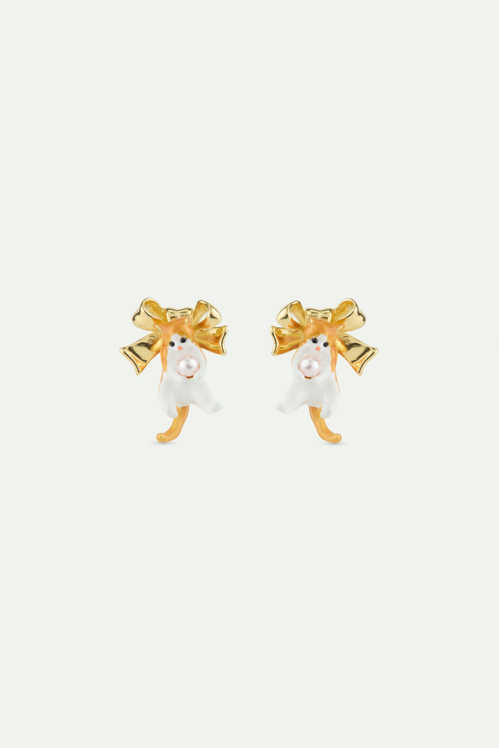 Orange tabby kitten and golden bow earrings