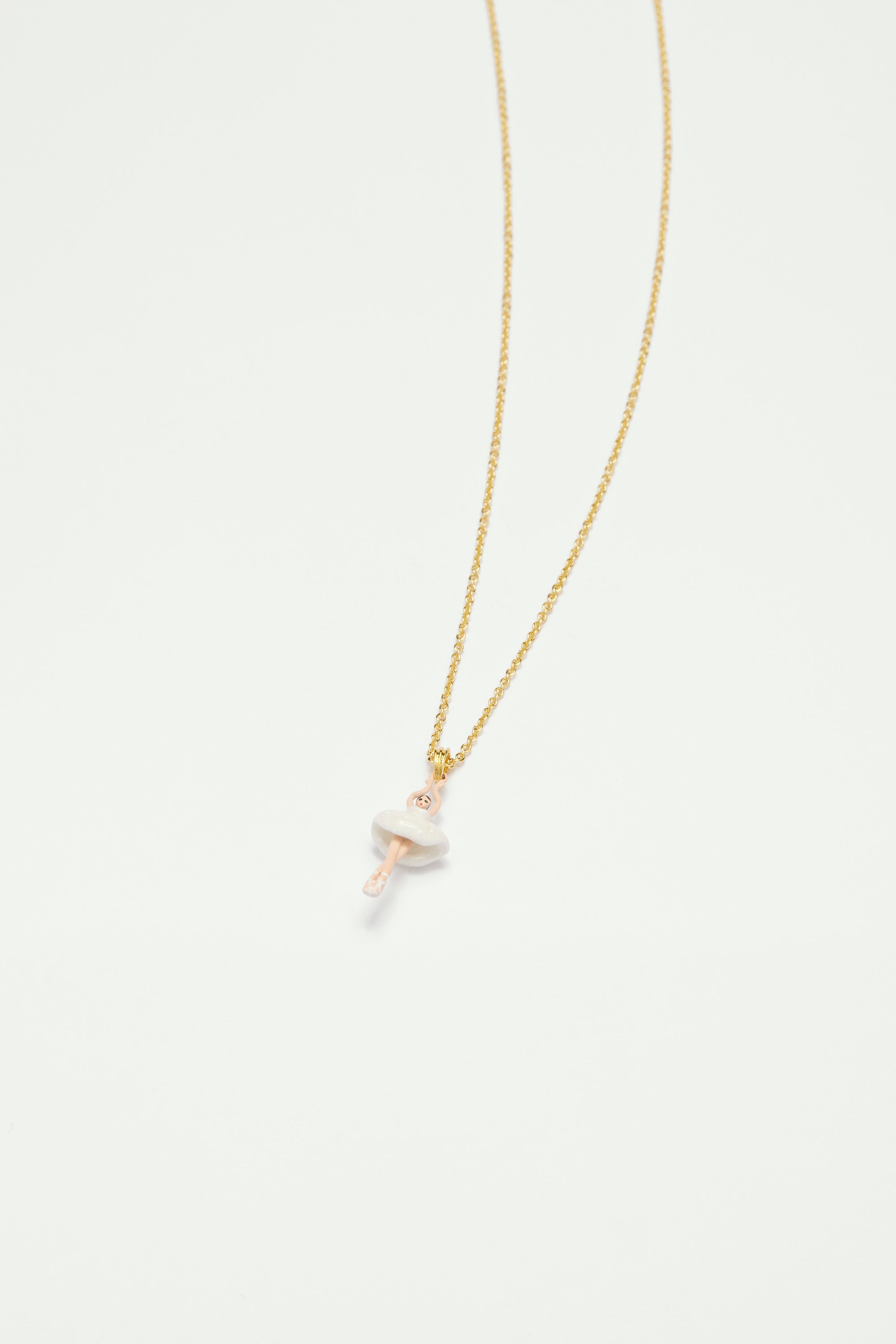 Necklace featuring mini ballerina in a white tutu