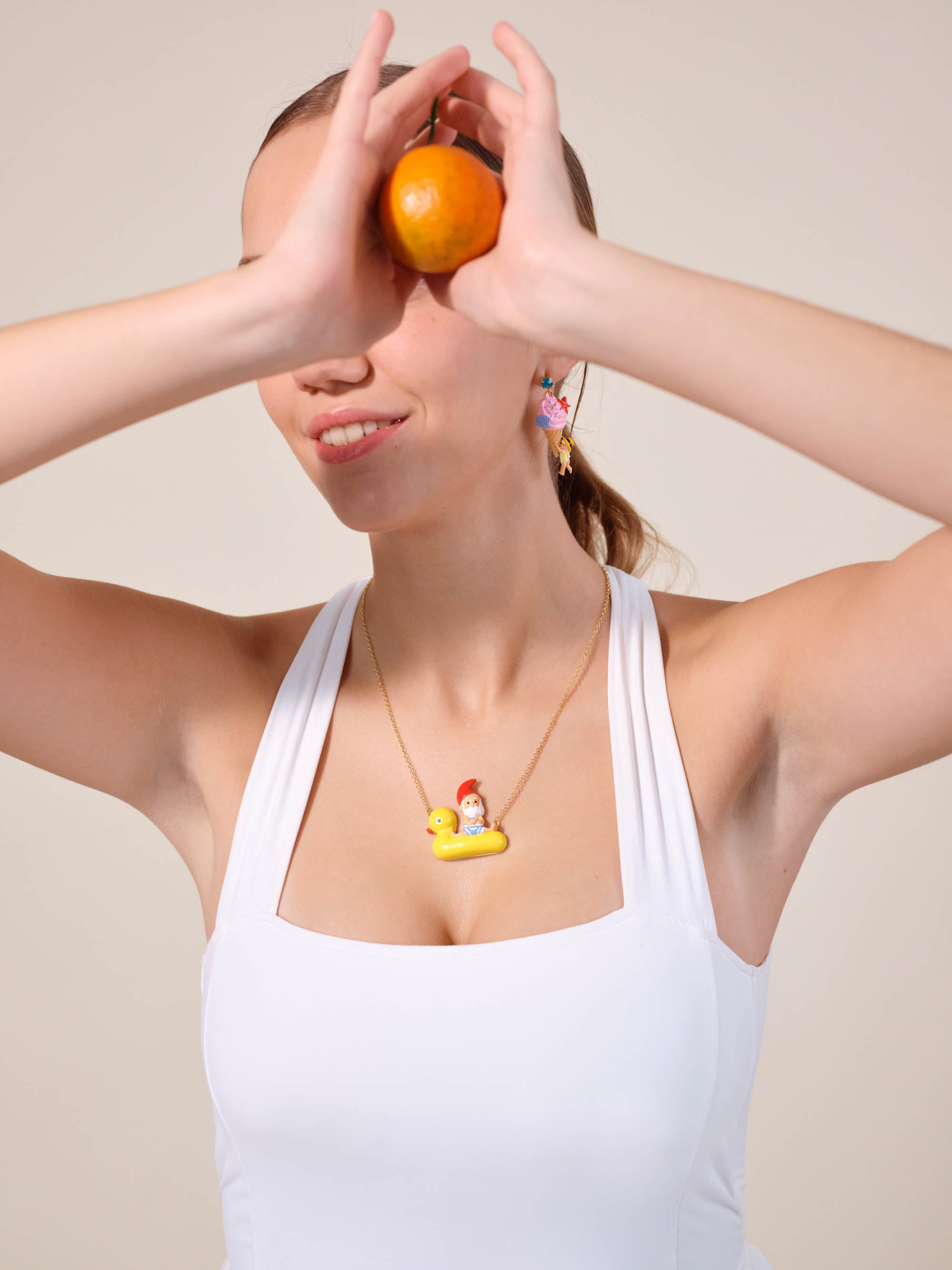 Garden gnome and inflatable duck ring statement necklace