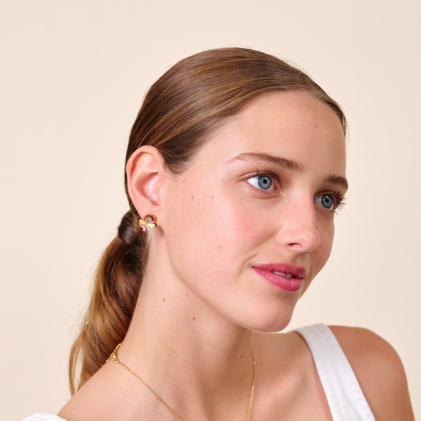 Butterfly and round stone earrings
