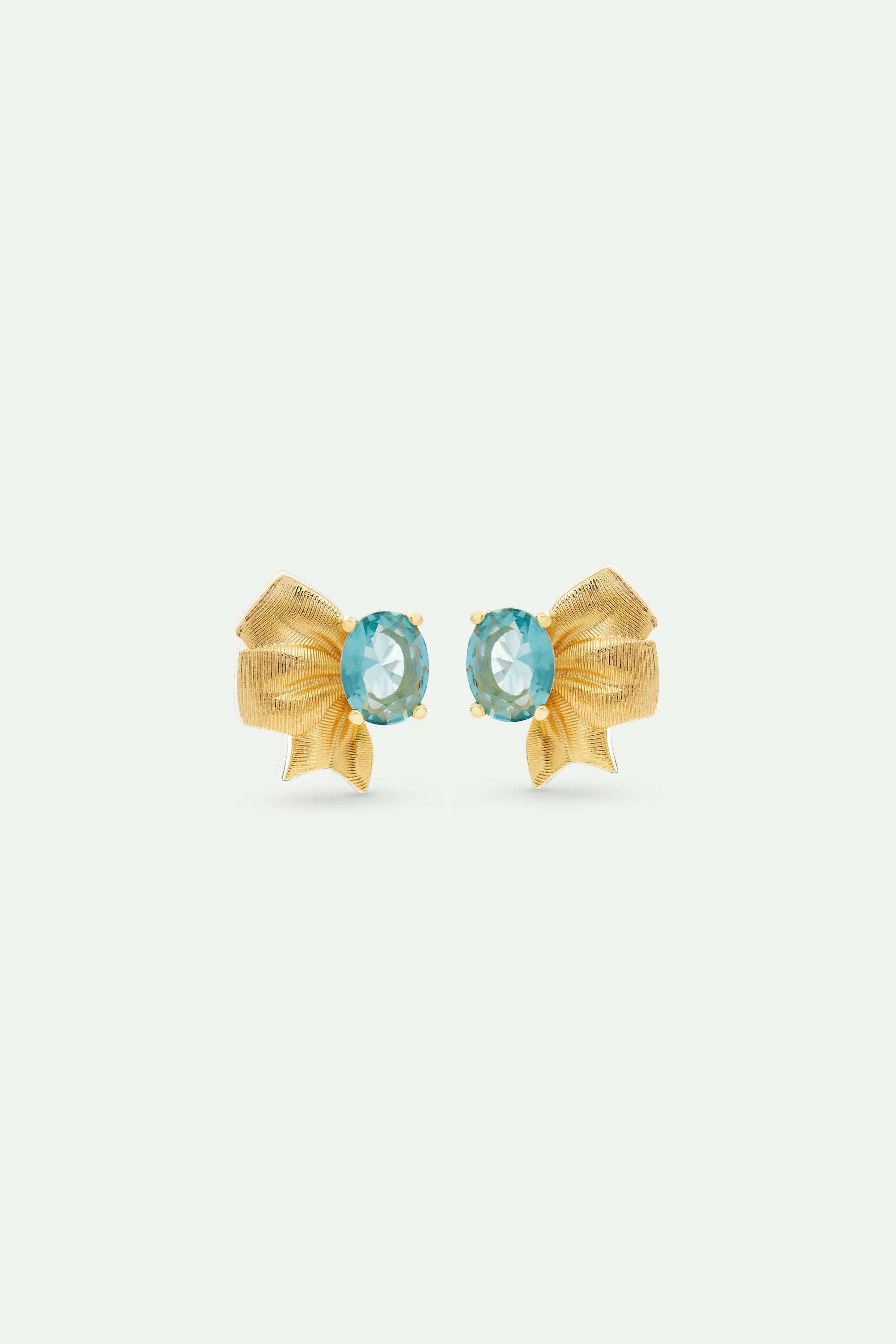 Gold ribbon and blue cut stone earrings