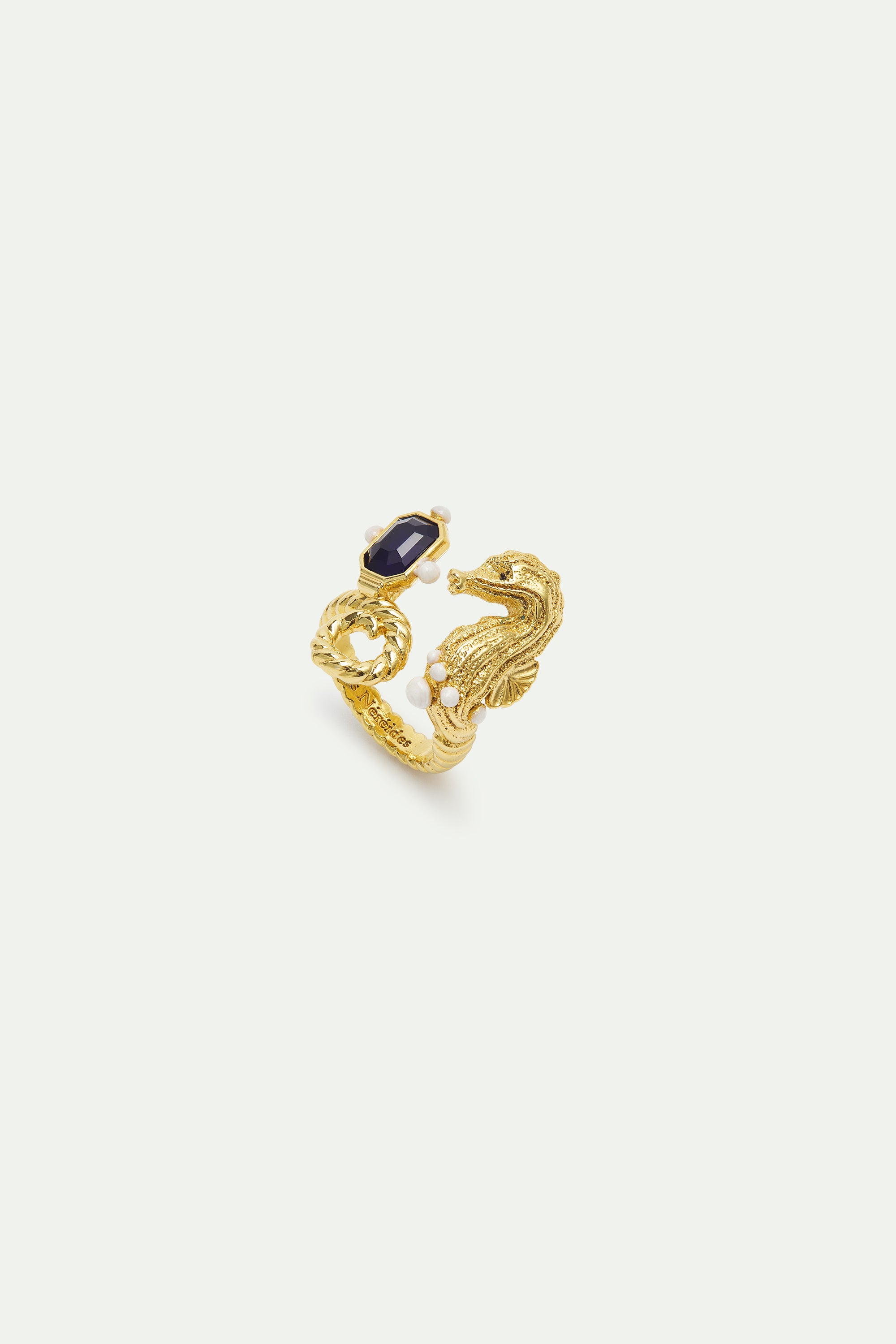 Adjustable ring with golden seahorse and navy blue stone