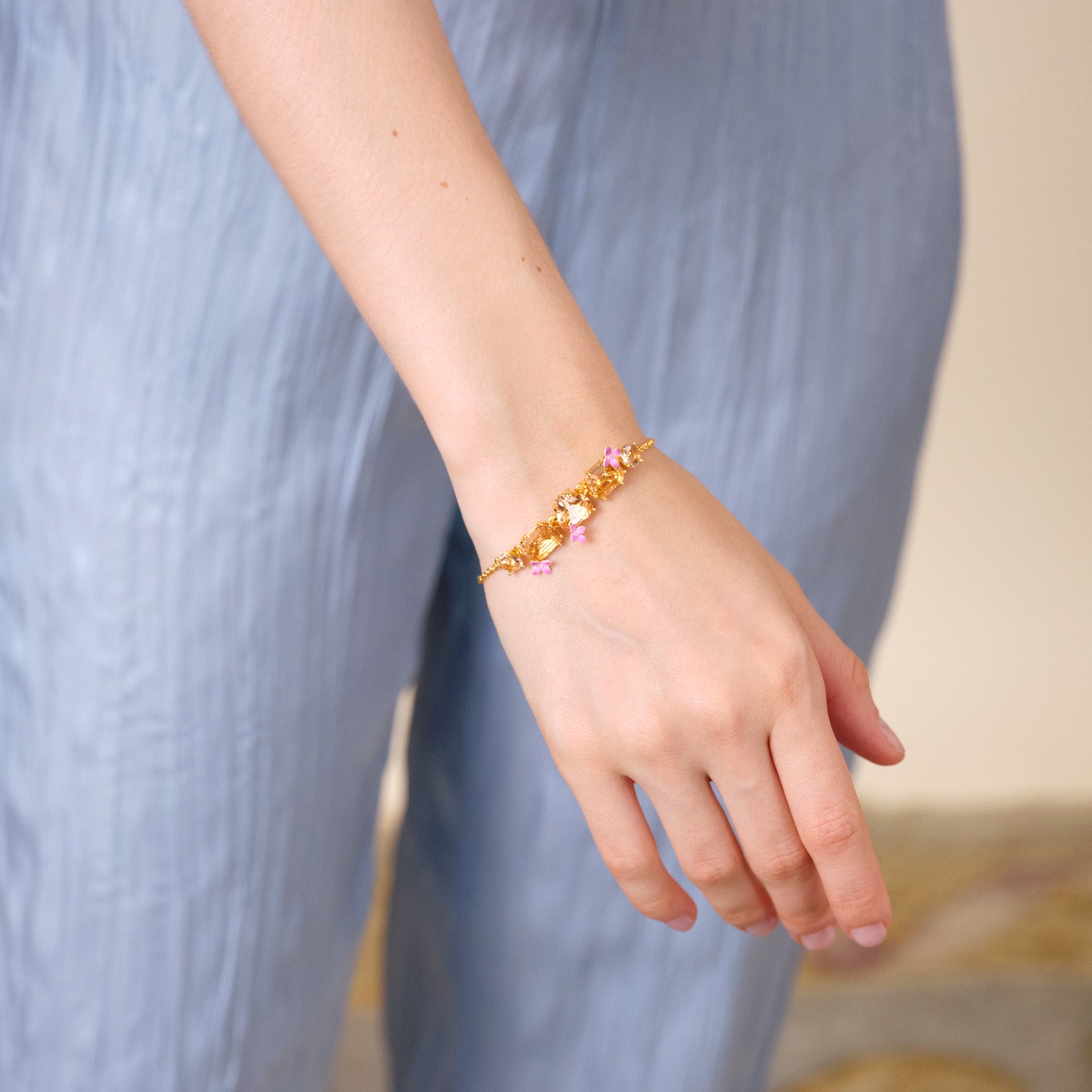 Apricot pink diamantine 5 stone and flower fine bracelet