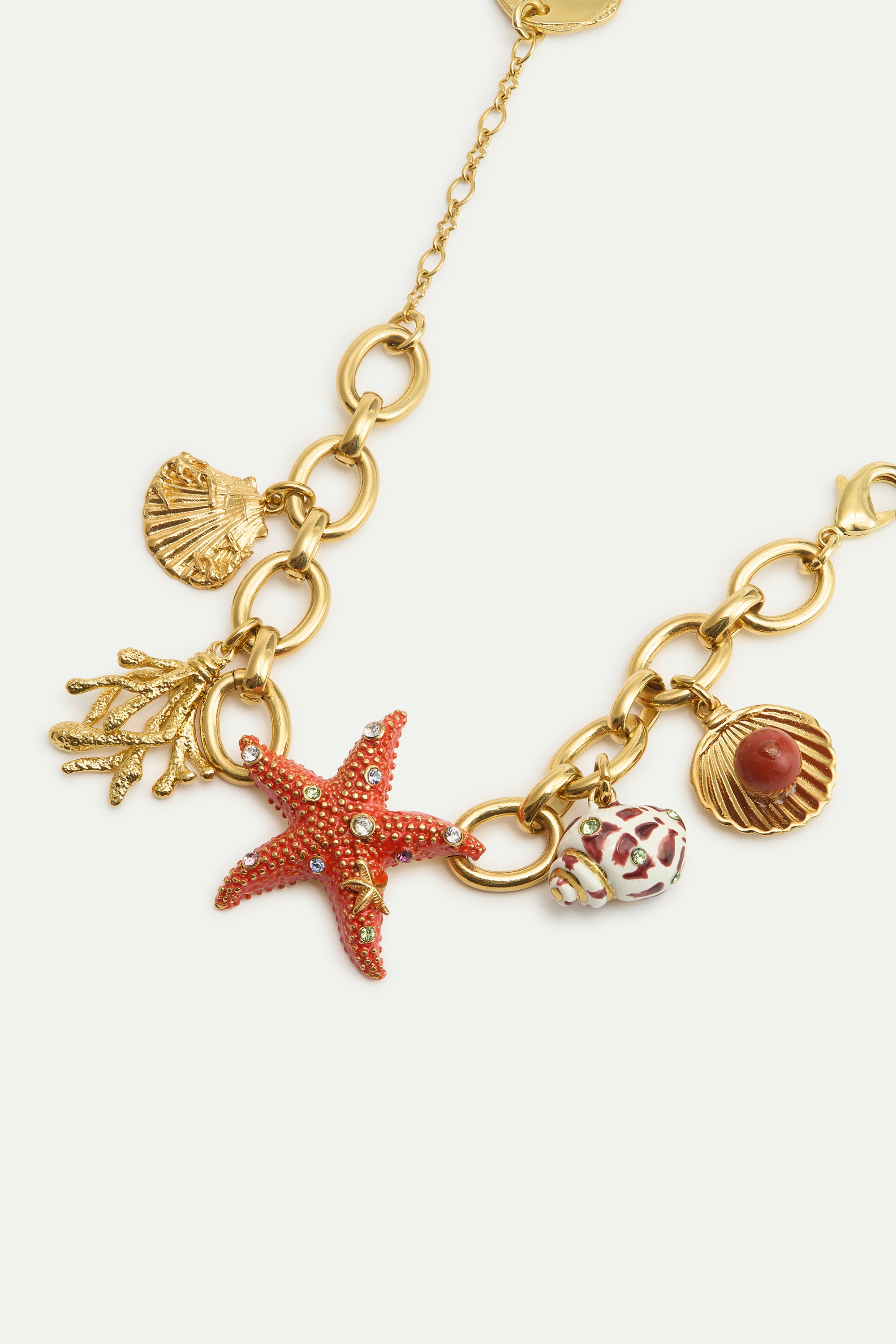 Golden starfish bracelet with shell pendants