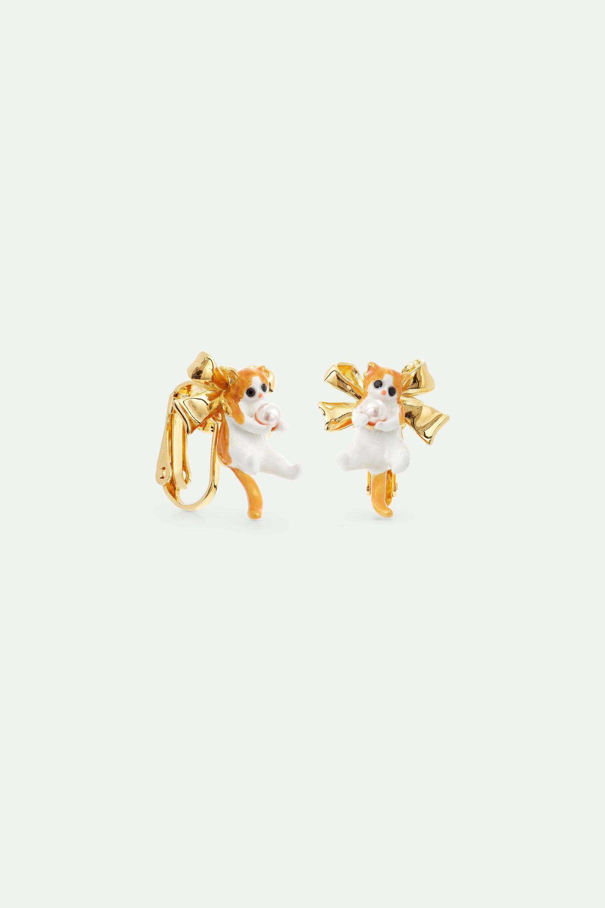Orange tabby kitten and golden bow earrings