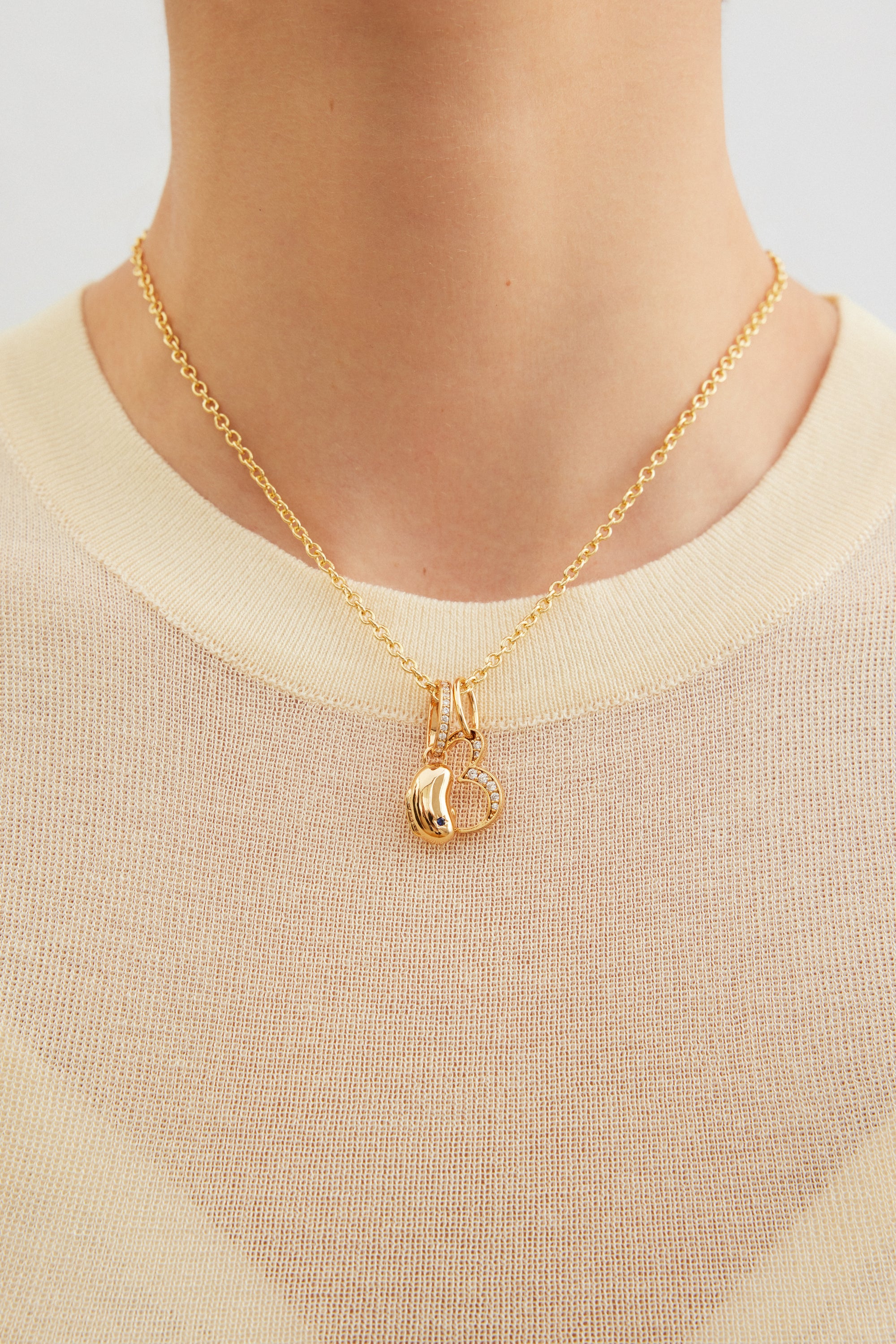Number 3 pendant, creativity and generosity