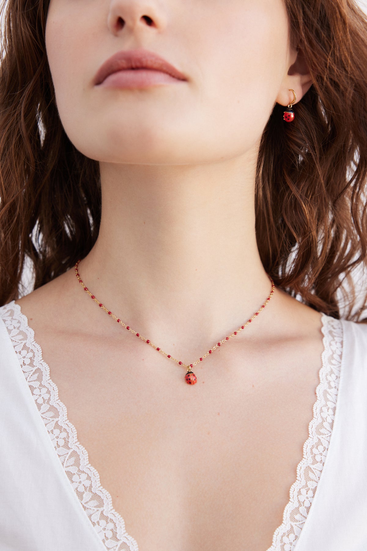 Red and black ladybird pendant necklace