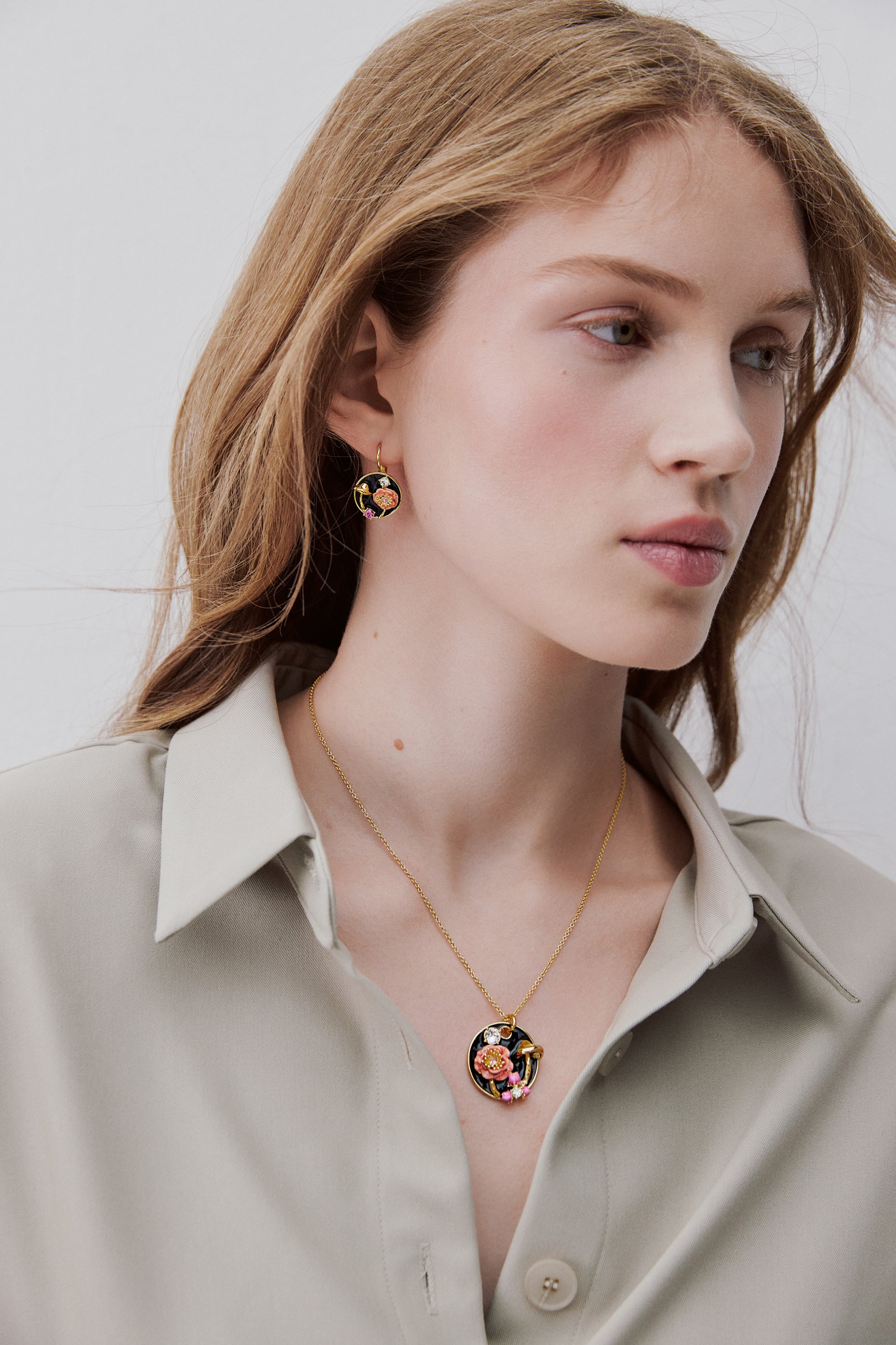 Black medallion pendant necklace with mushroom, anemone and crystals