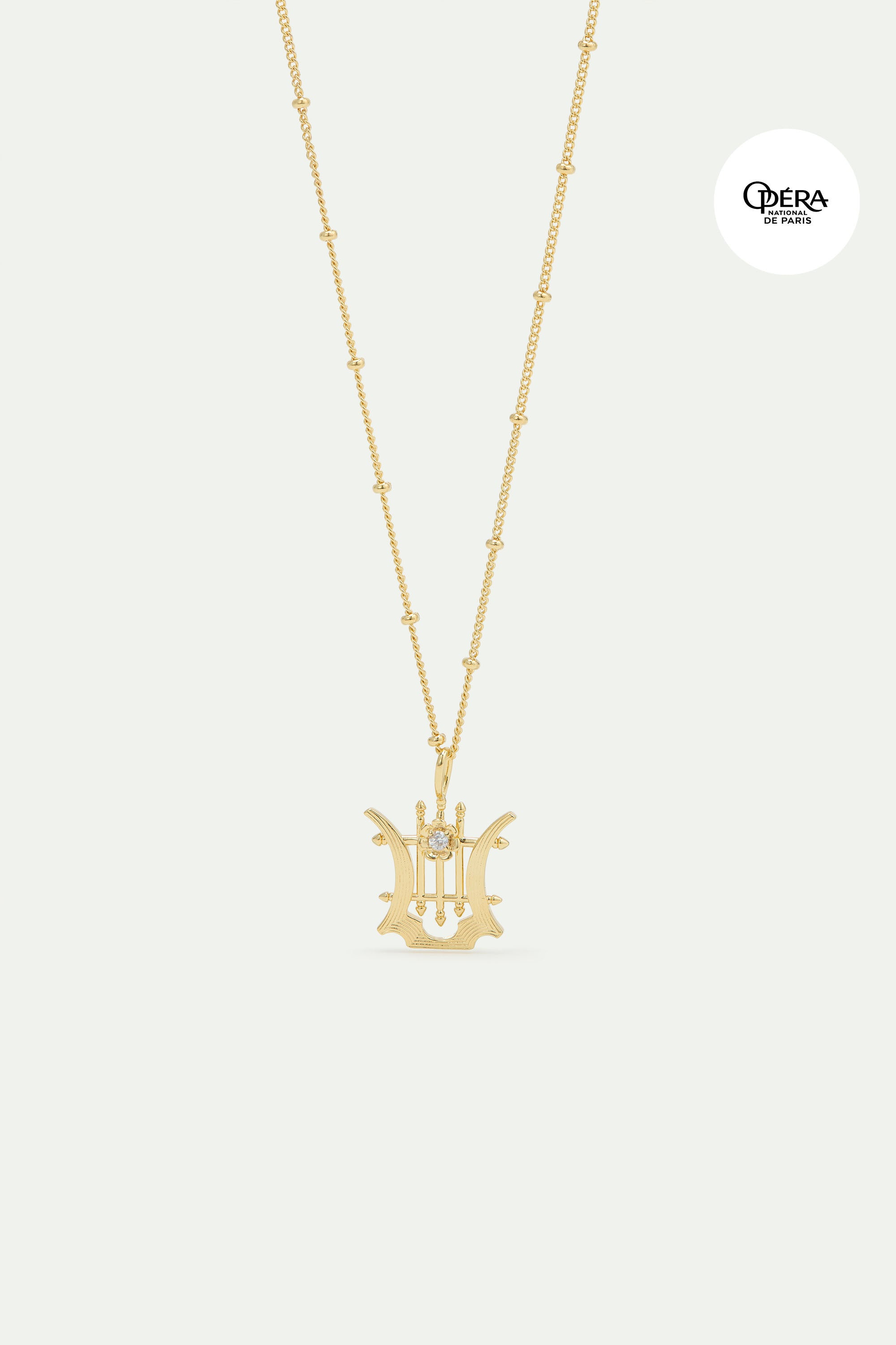 Golden lyre pendant necklace