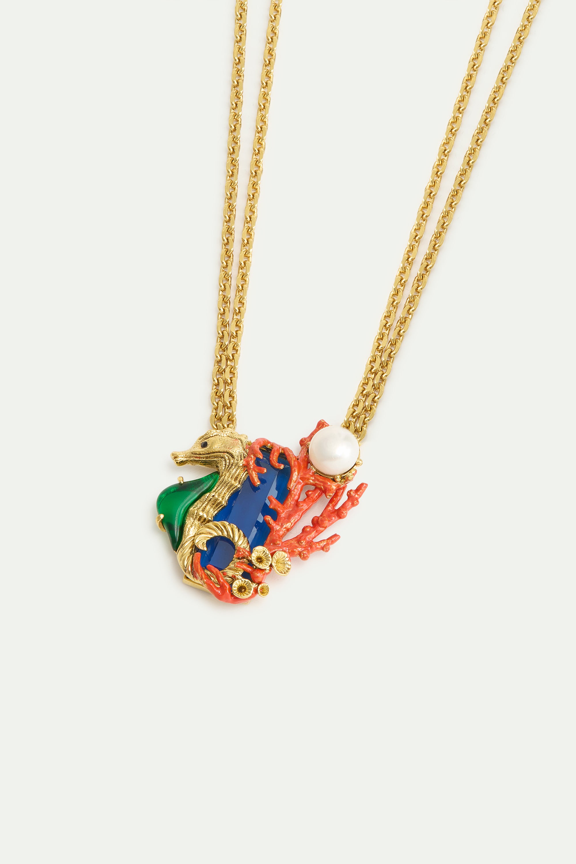 Navy blue stone necklace with green and golden seahorse