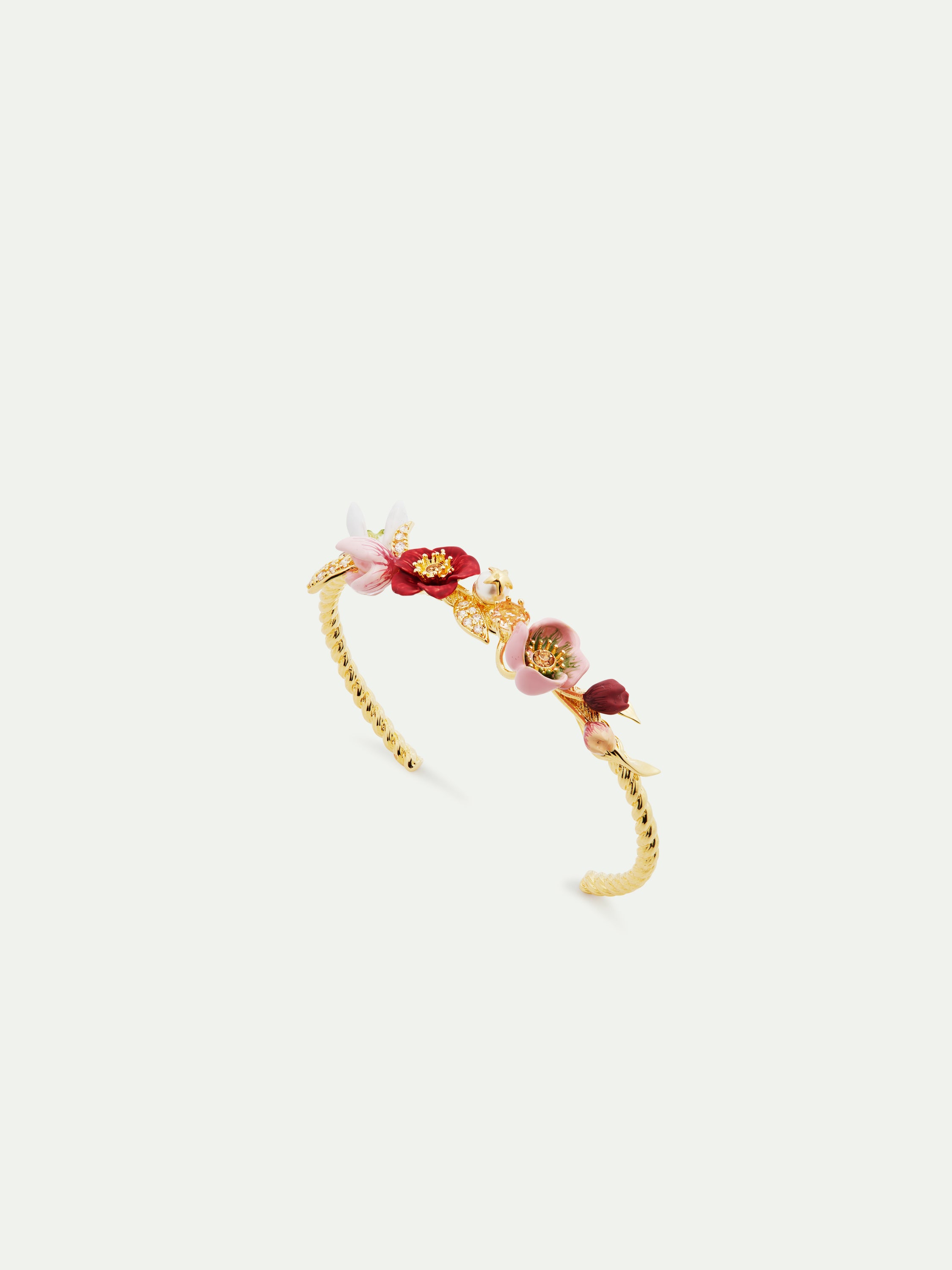 Cuff bracelet composed of hellebore flower, glass pearl beads and leaves paved with cubic zirconia