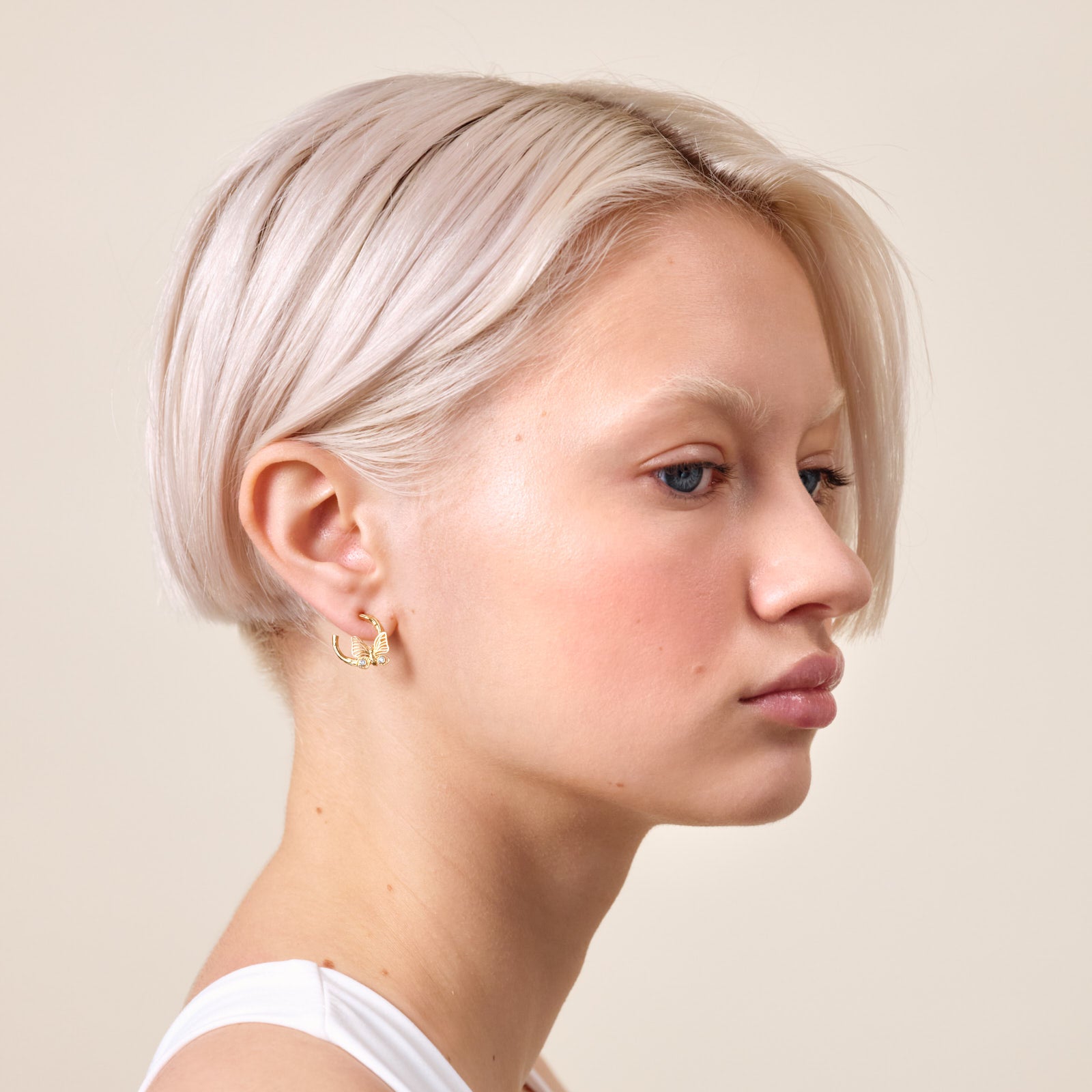 Golden butterfly and crystal post earrings