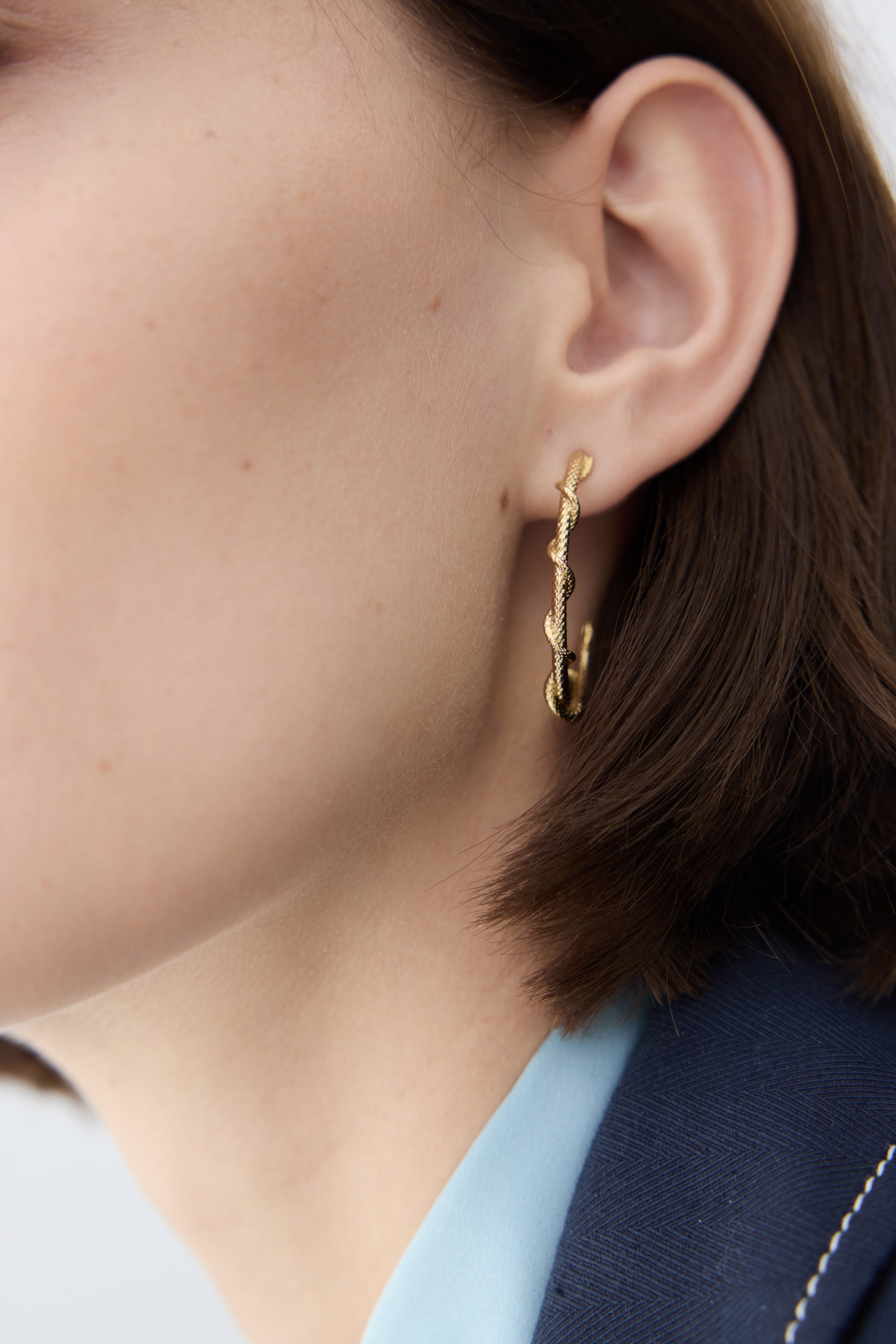 Gold snake post hoop earrings