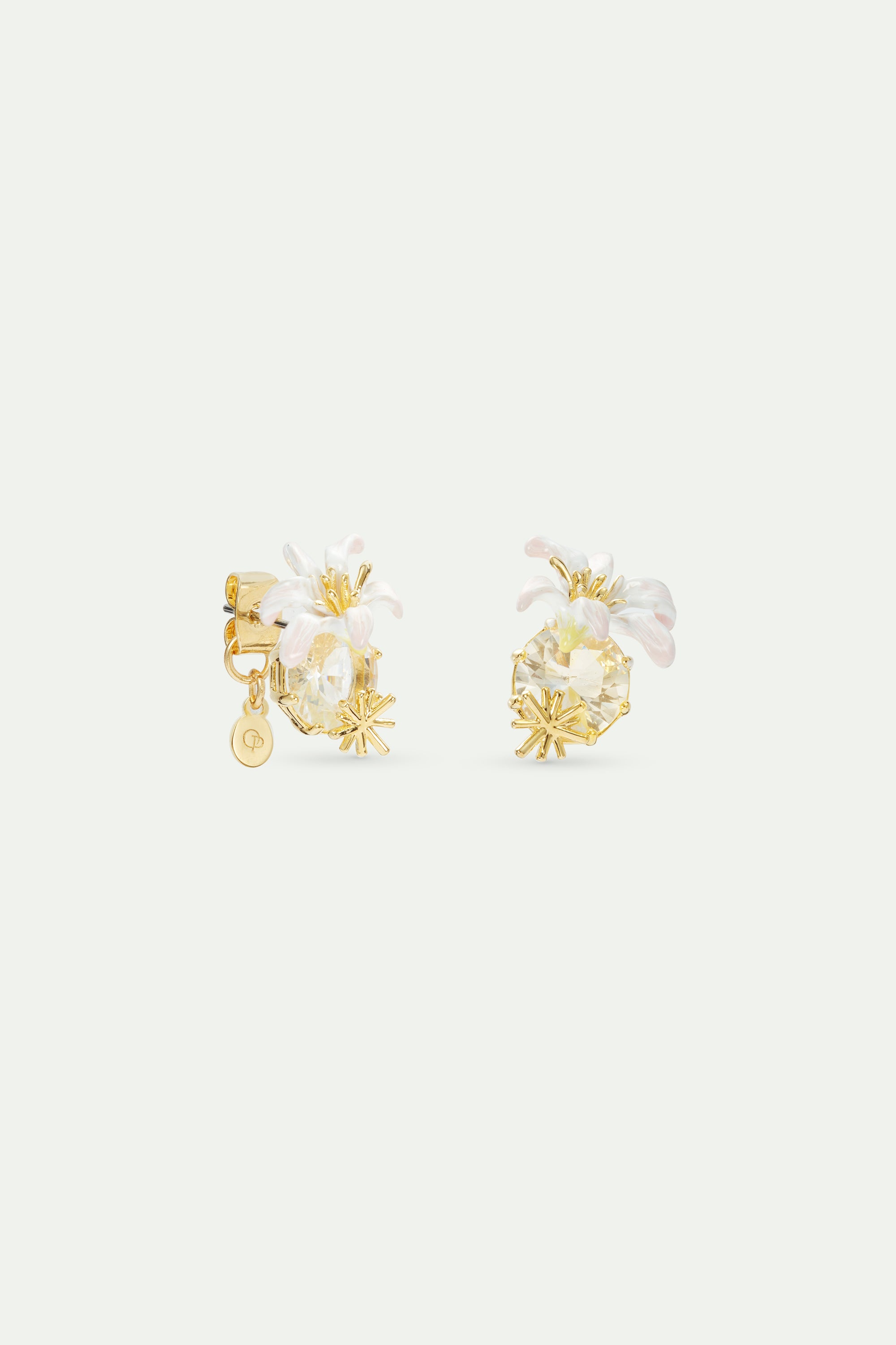 Round faceted stone earrings and white lily