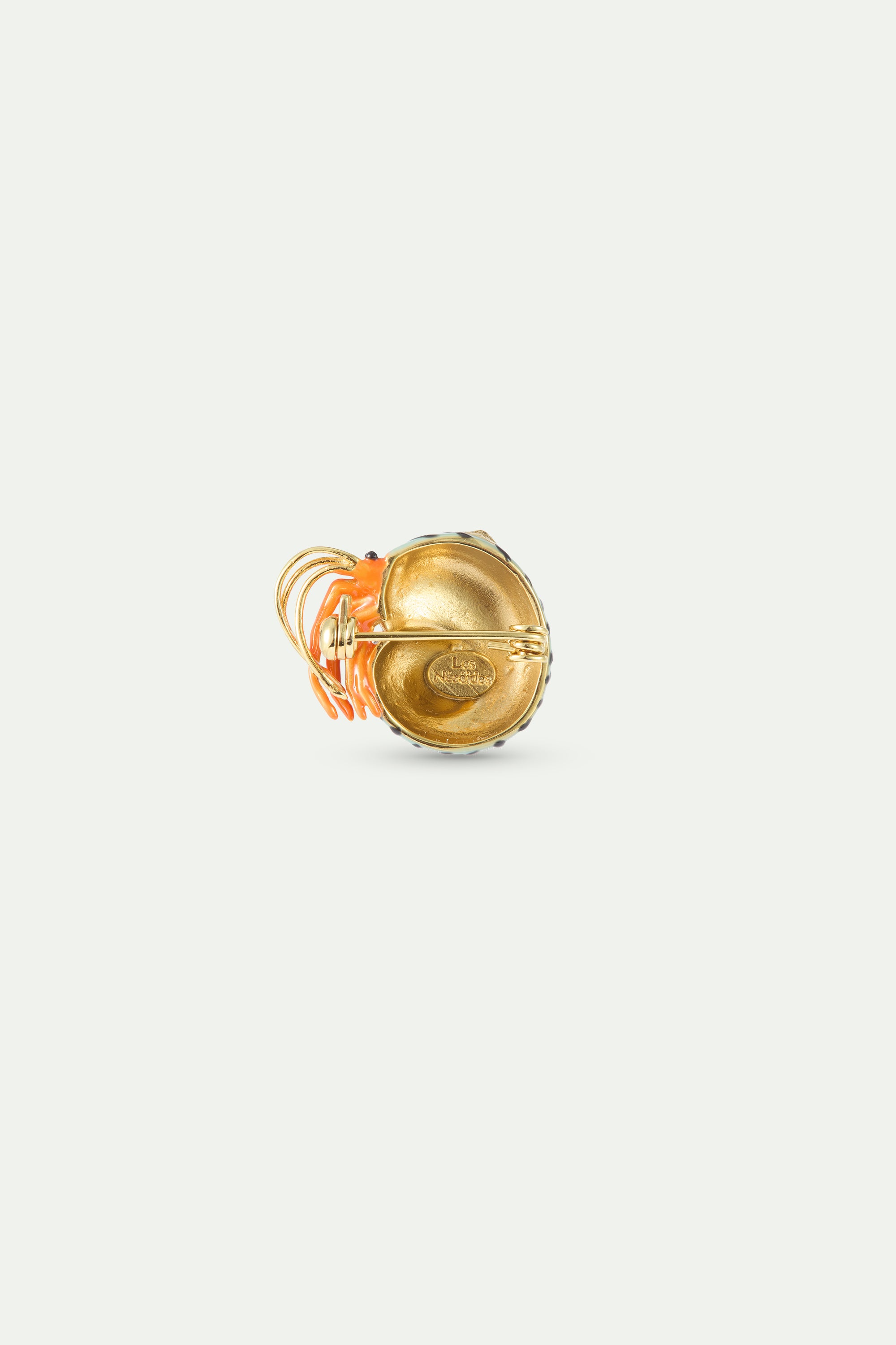 Green and orange hermit crab brooch