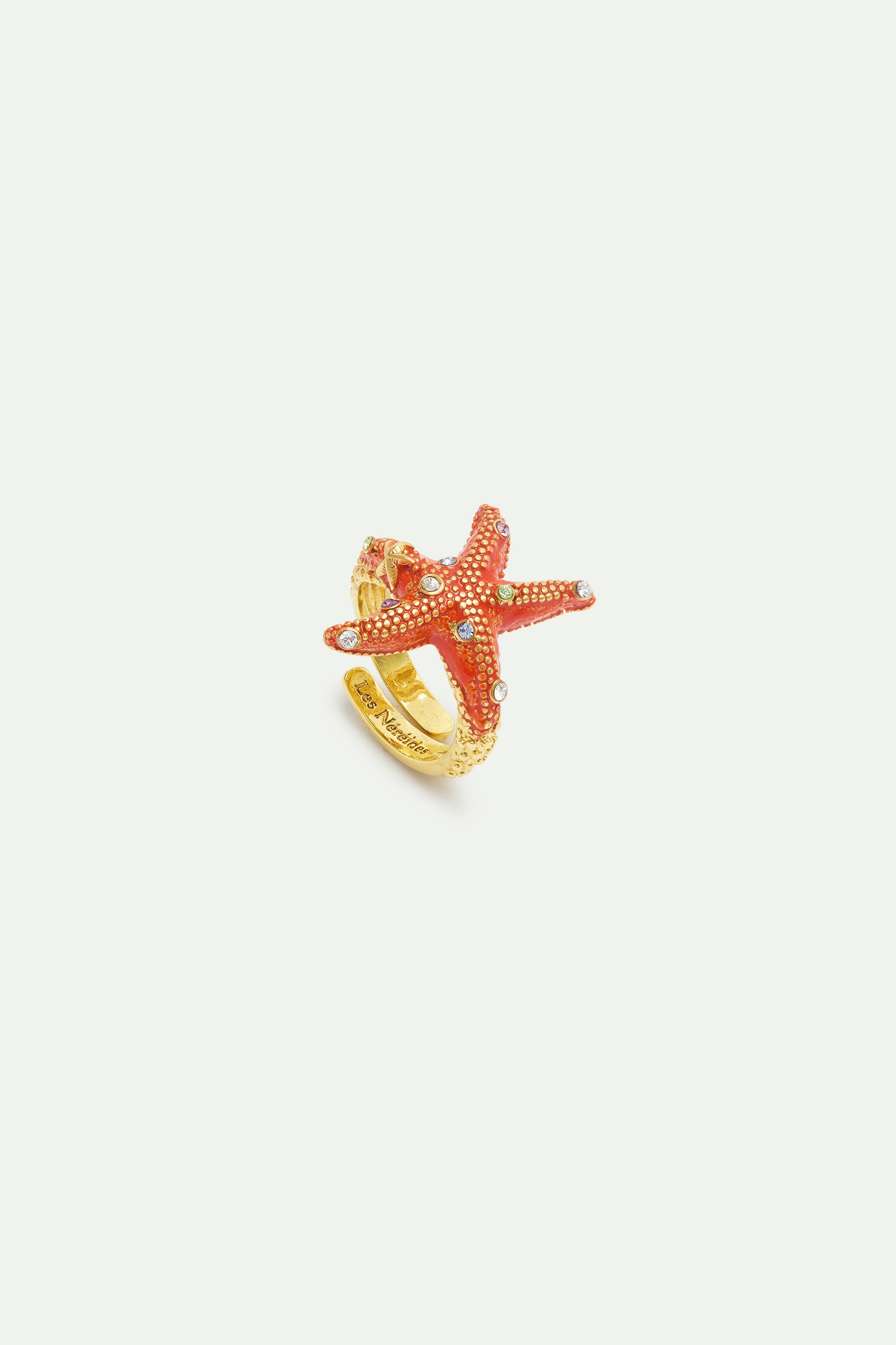 Adjustable orange starfish ring with multicoloured crystals