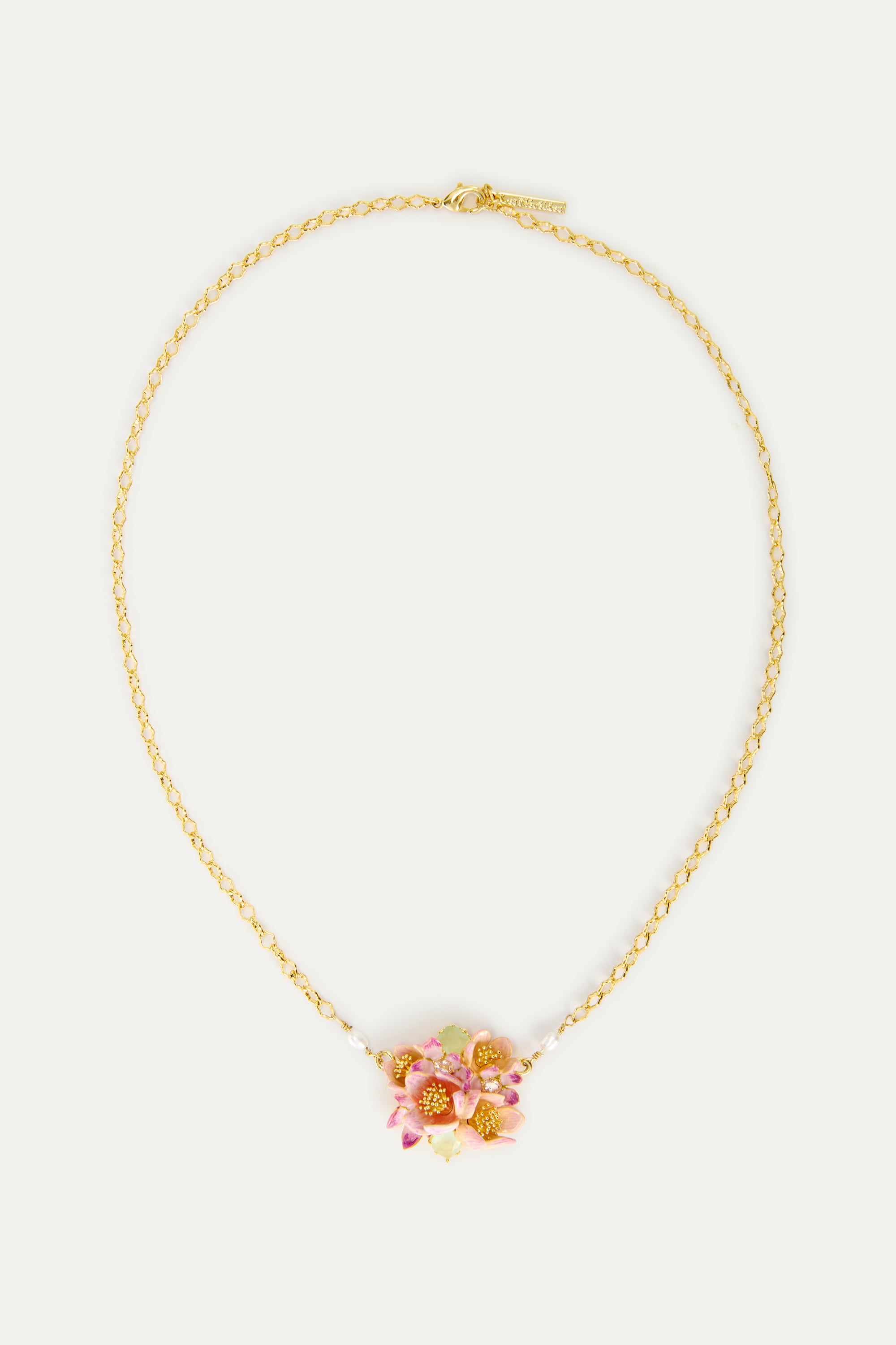 Bouquet of pink hellebores and green stone statement necklace