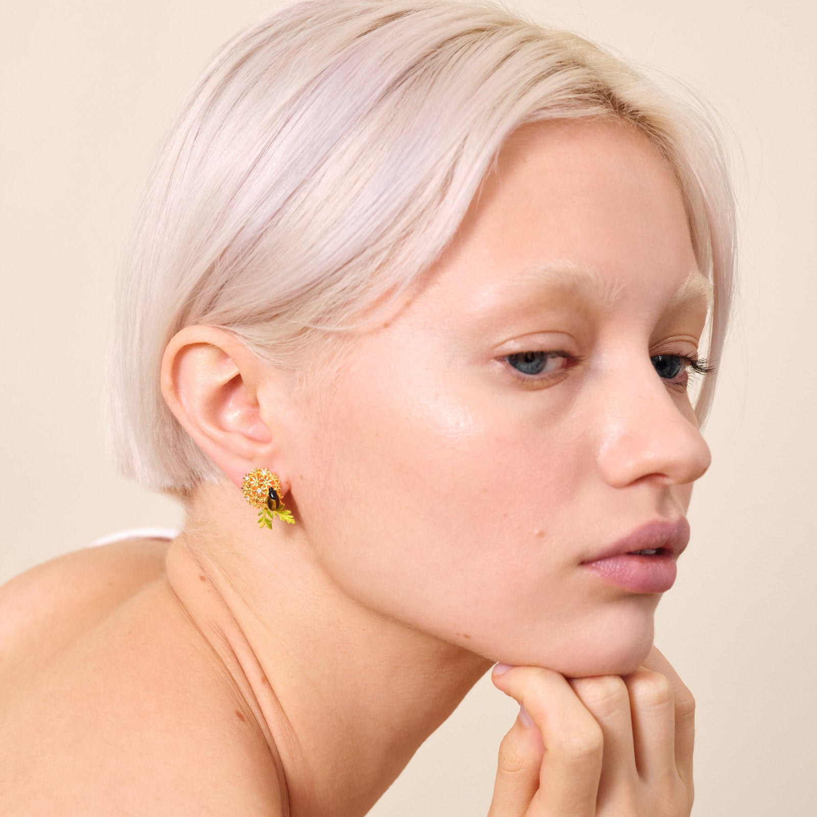 Golden flower bouquet and scarab beetle earrings