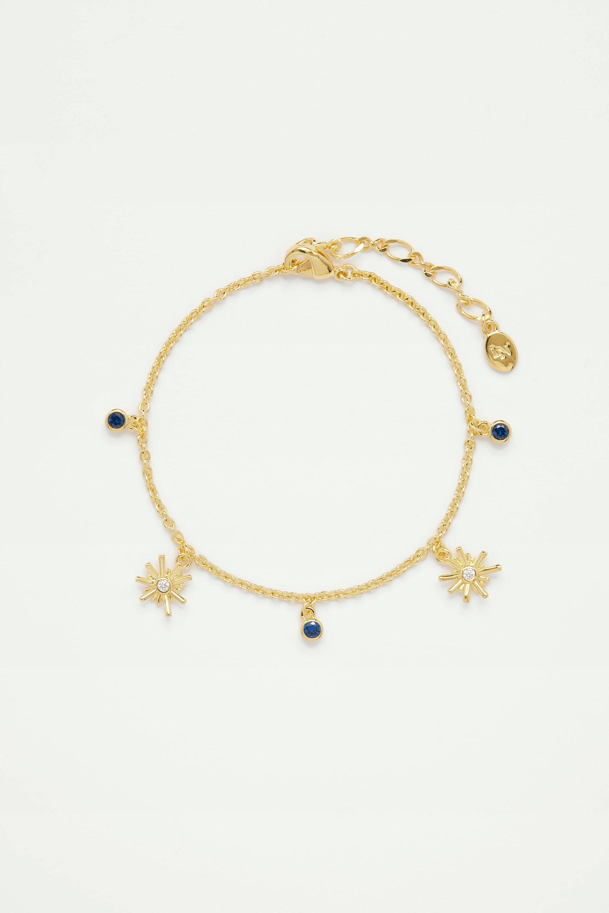 Gold stars and midnight blue stone charm bracelet