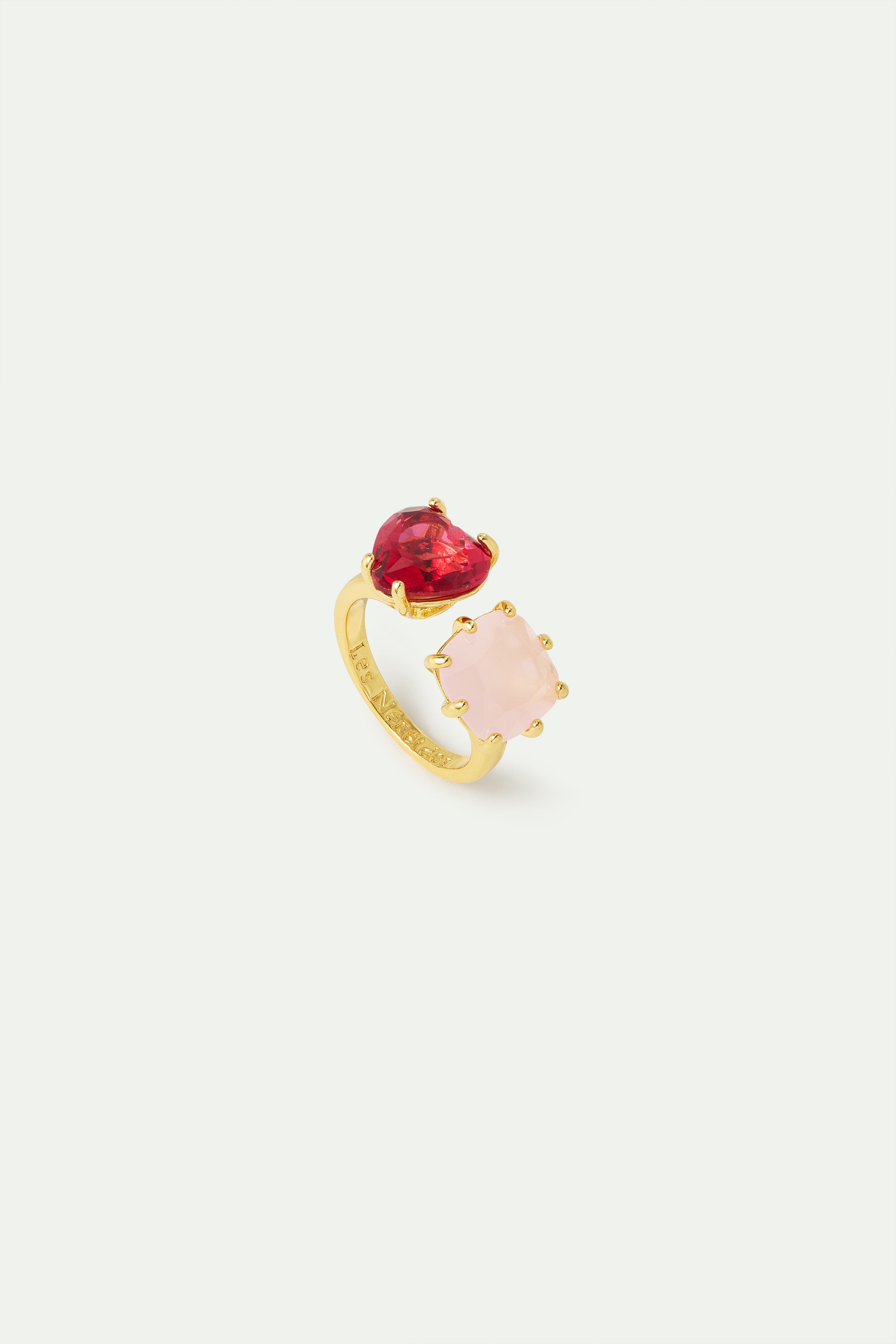 Dark pink and light pink Diamantine you and me ring with heart-shaped and square stones.