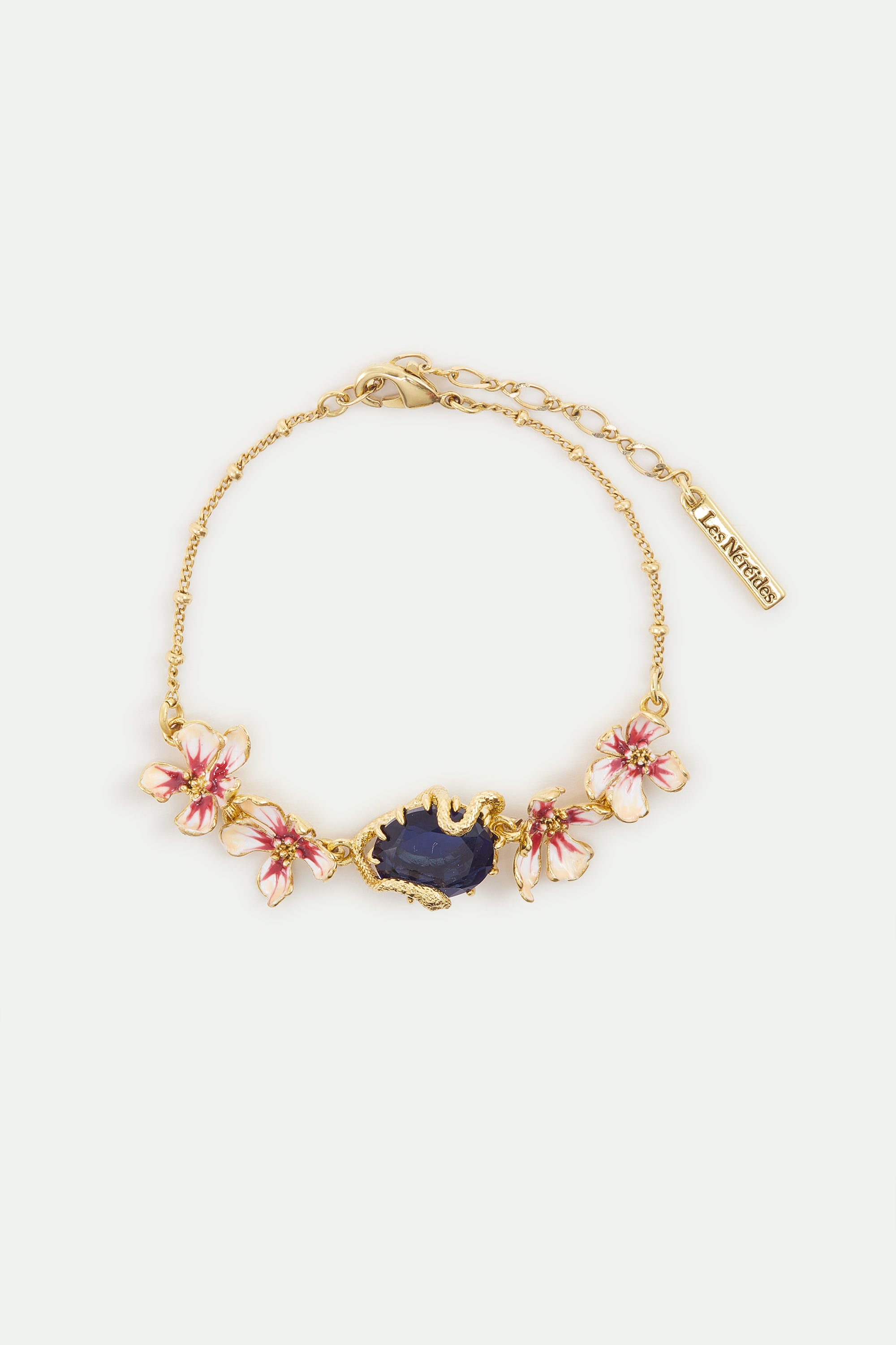 Bracelet with blue faceted stone, gold snake and mallow flowers