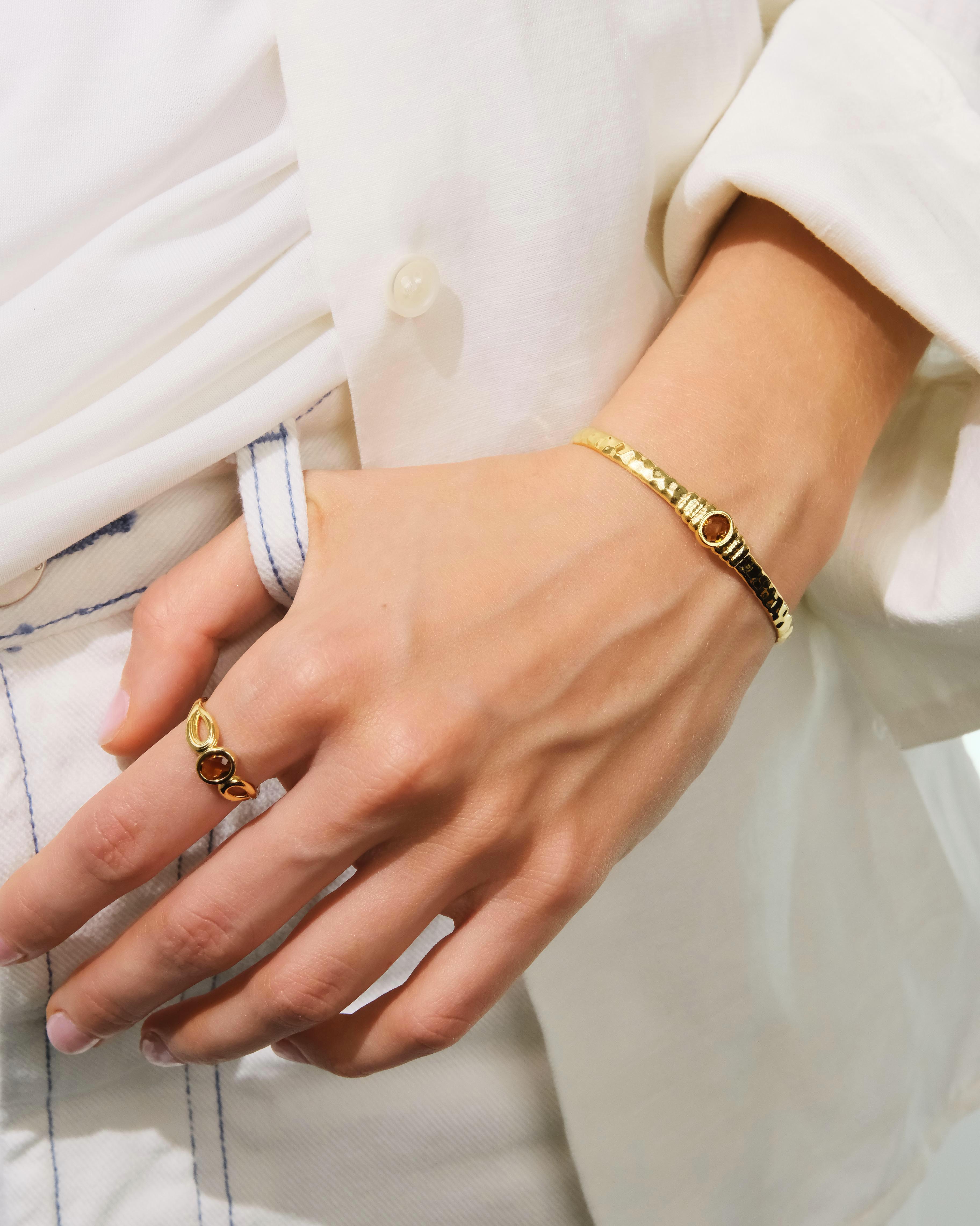 Gold and faceted glass cuff bracelet