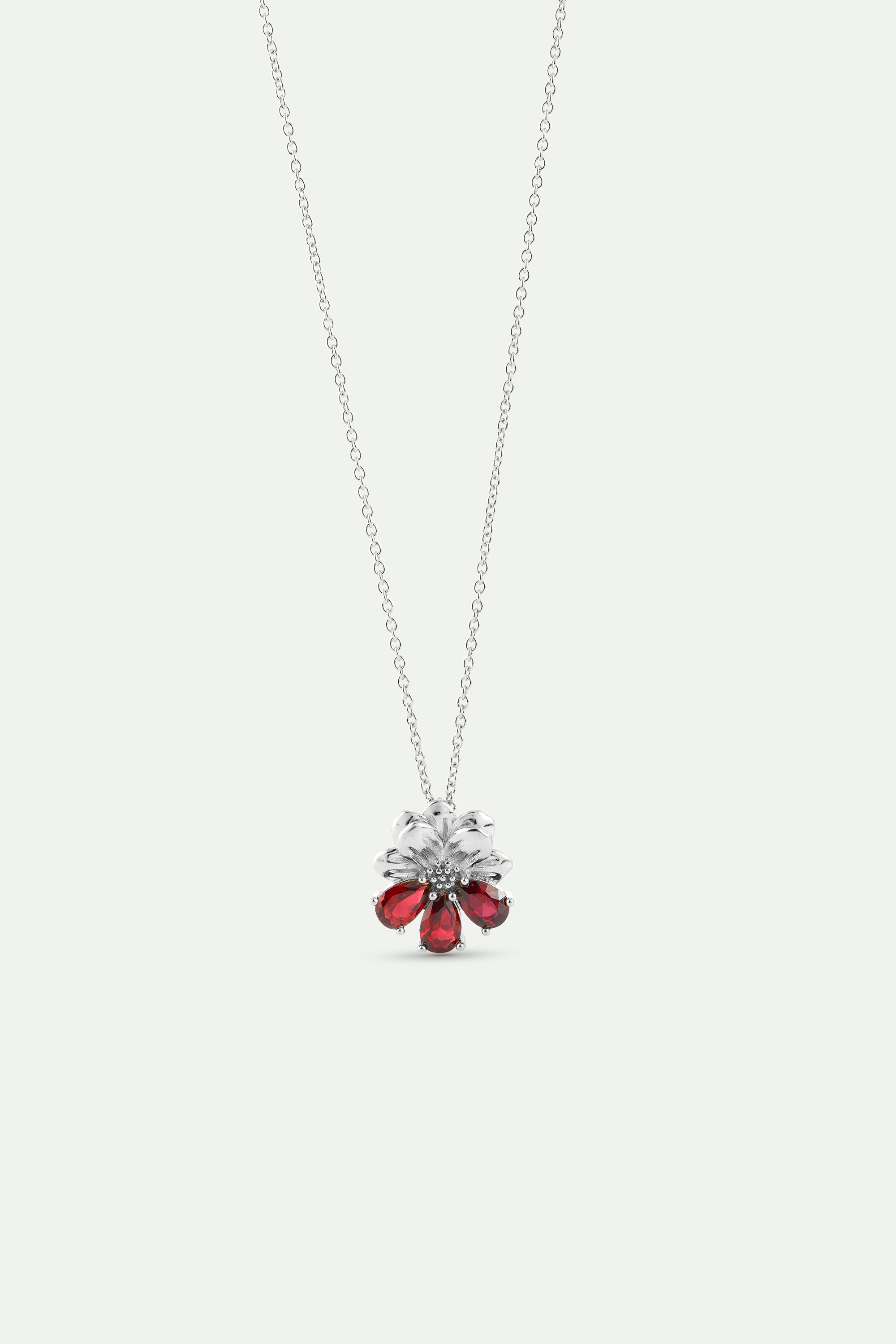 Silver pendant necklace with cosmos and red stones