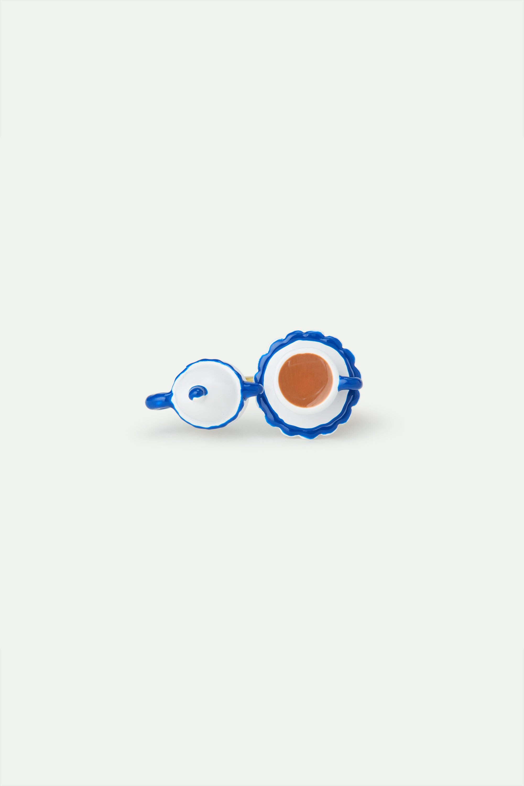 Adjustable ring with blue and white teapot and yellow rhinestone