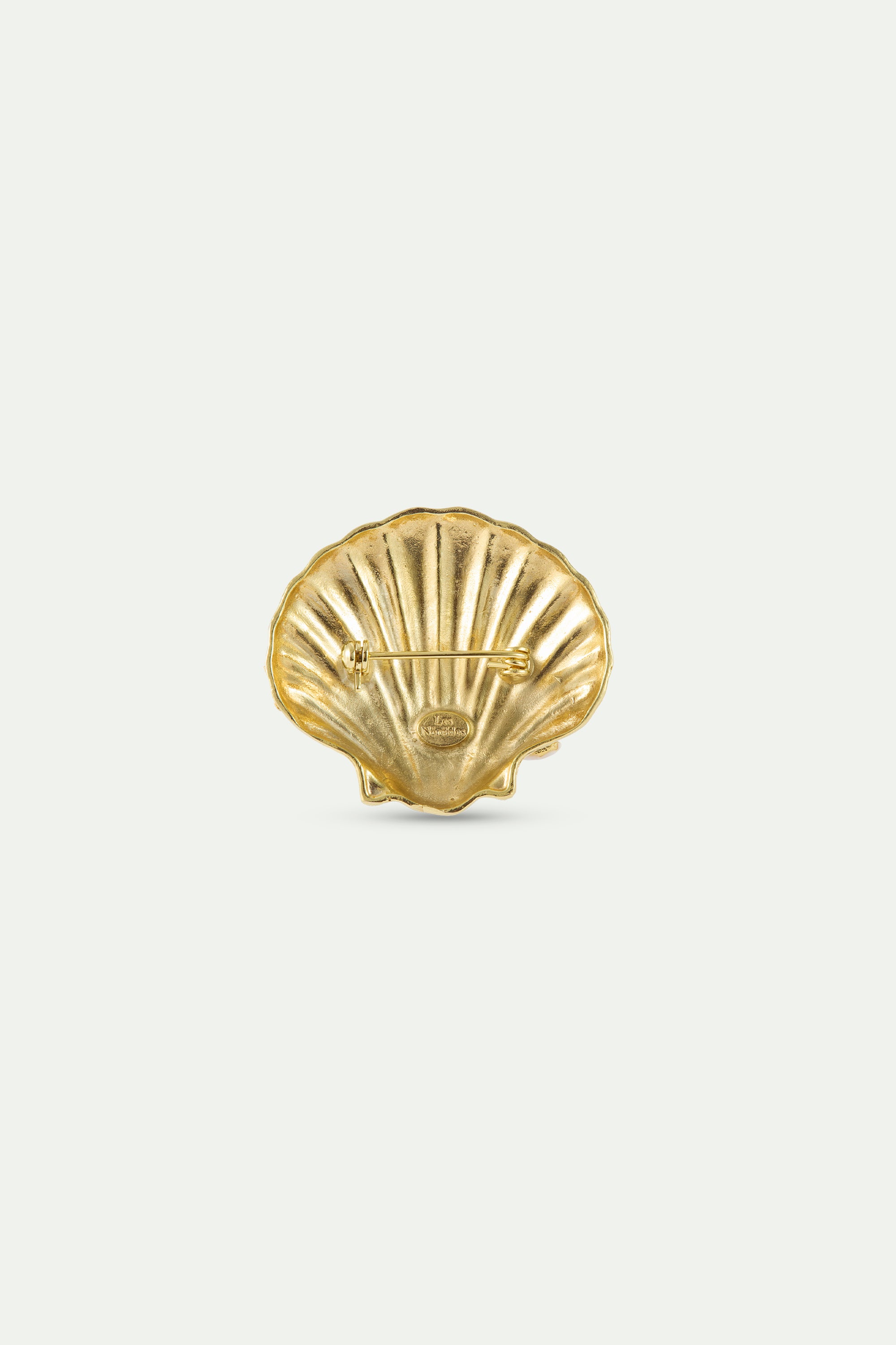 Golden seashell and white fish brooch