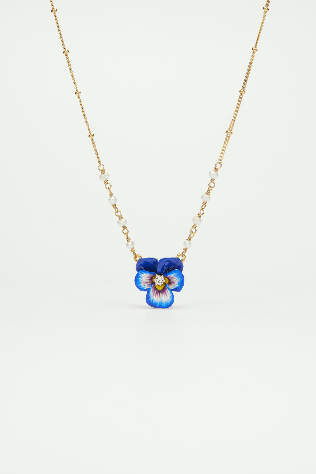 Blue pansy and faceted crystal pendant necklace