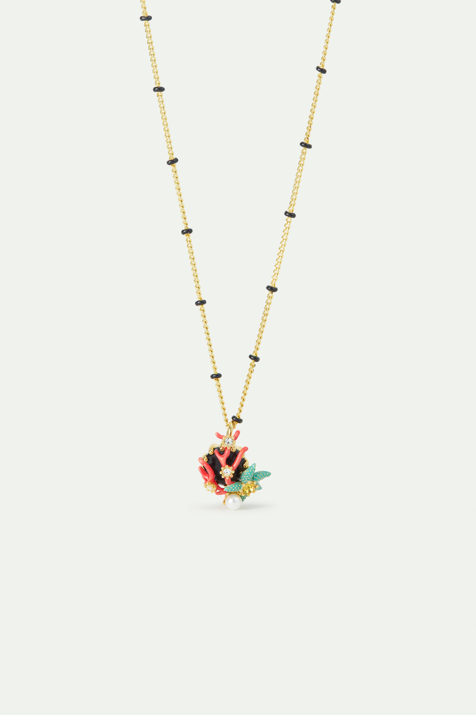 Pendant necklace with round black faceted glass stone, blue starfish and cultured pearl