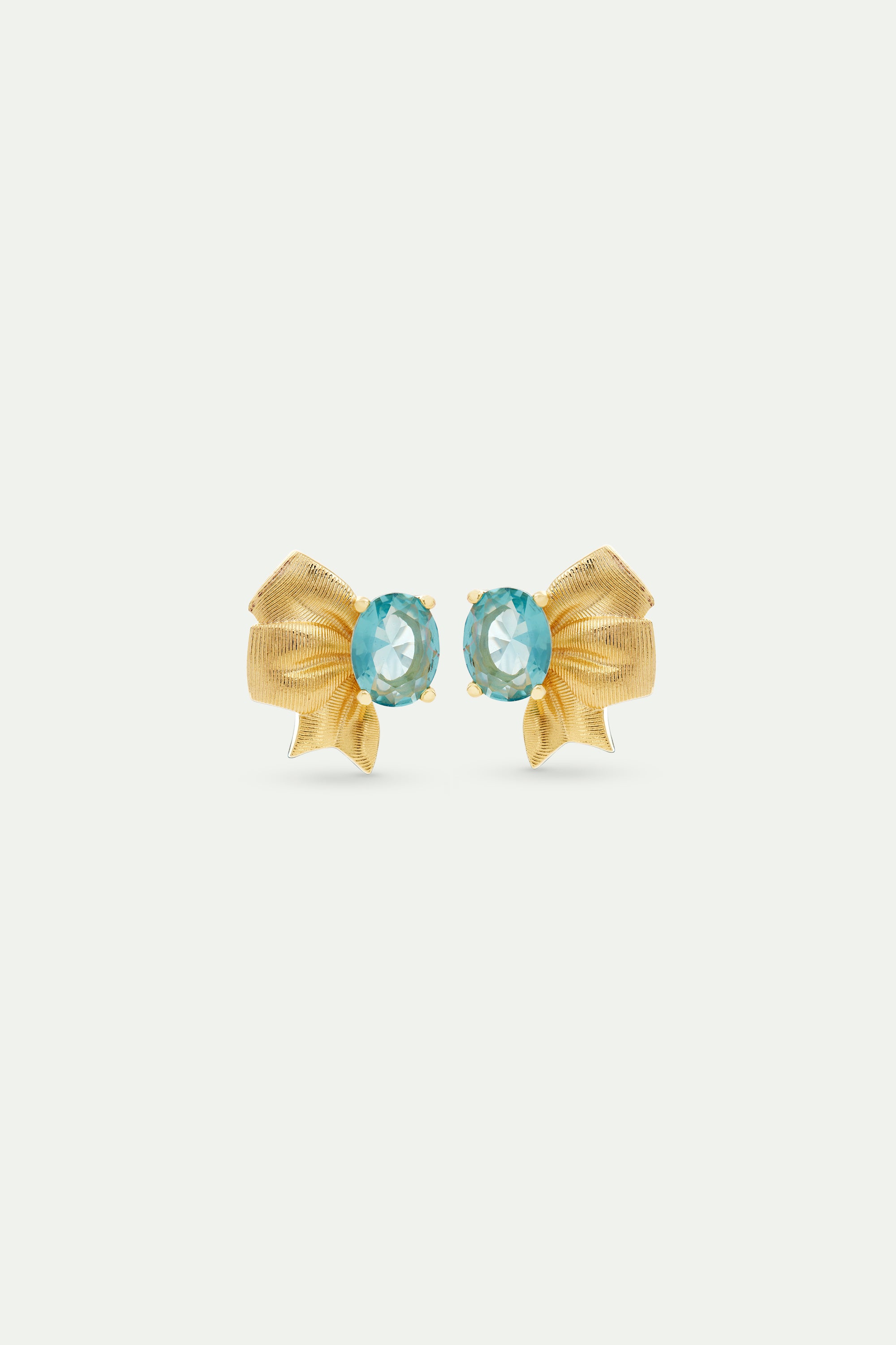 Gold ribbon and blue cut stone earrings