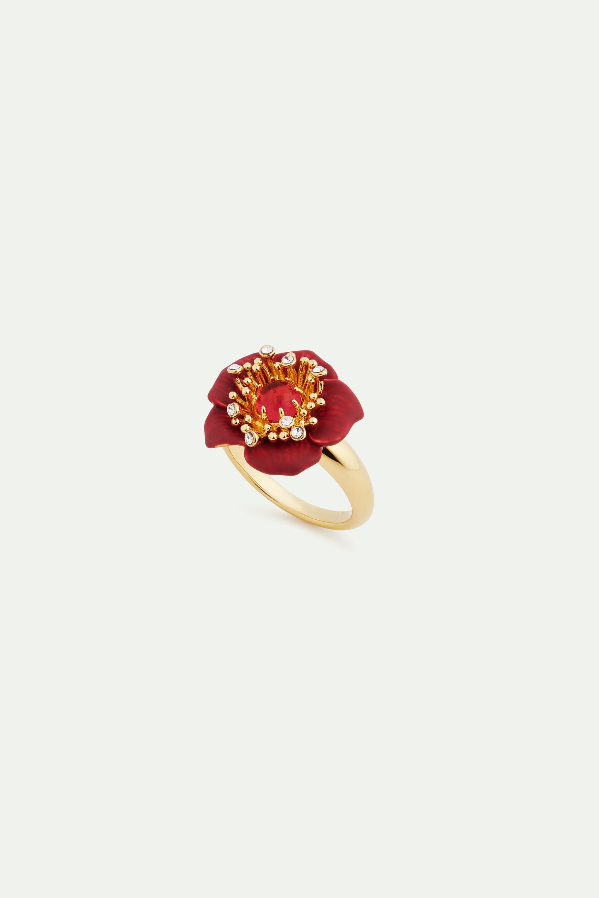 Fine ring with red hellebore flower