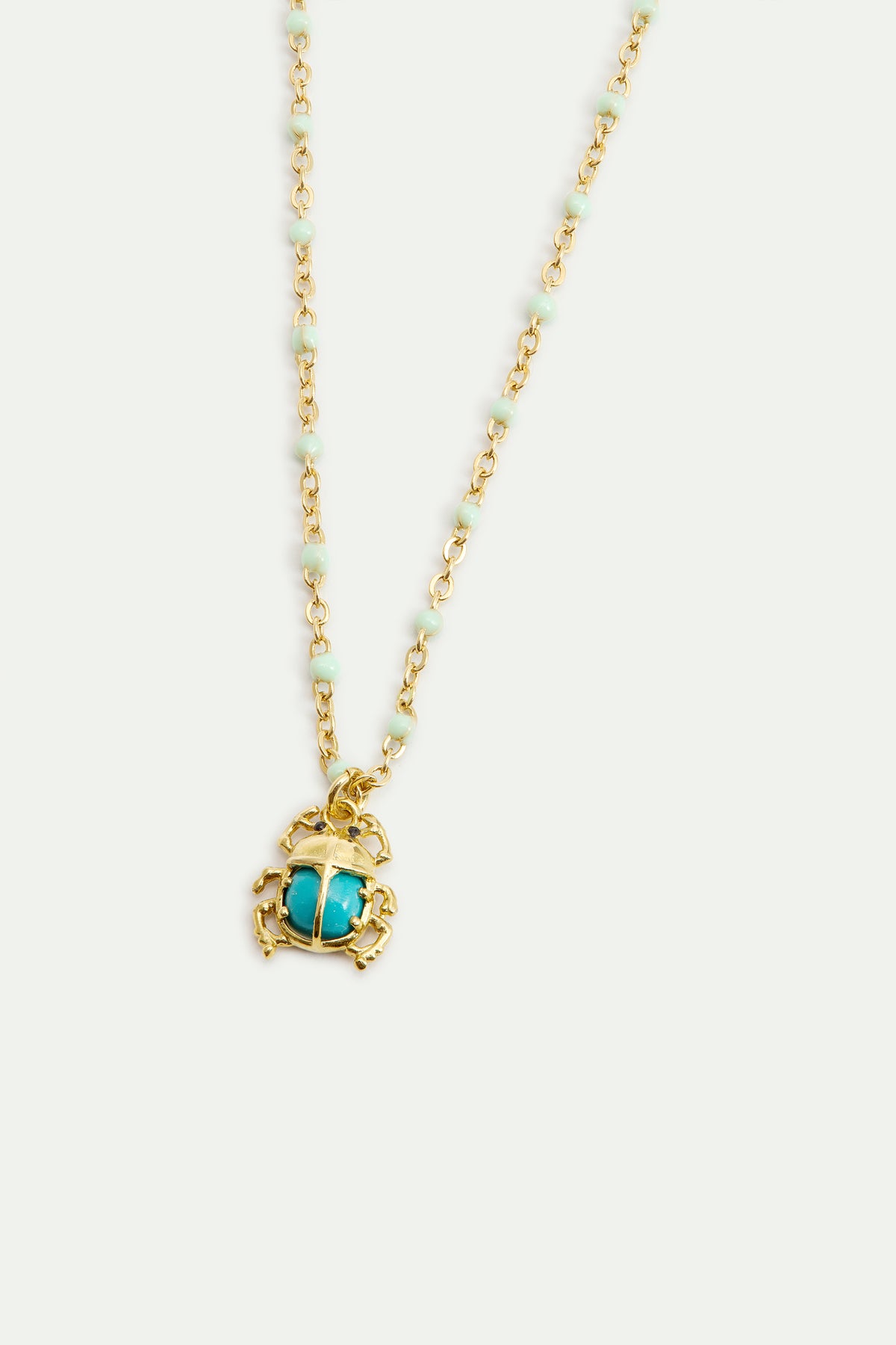 Turquoise and gold beetle pendant necklace