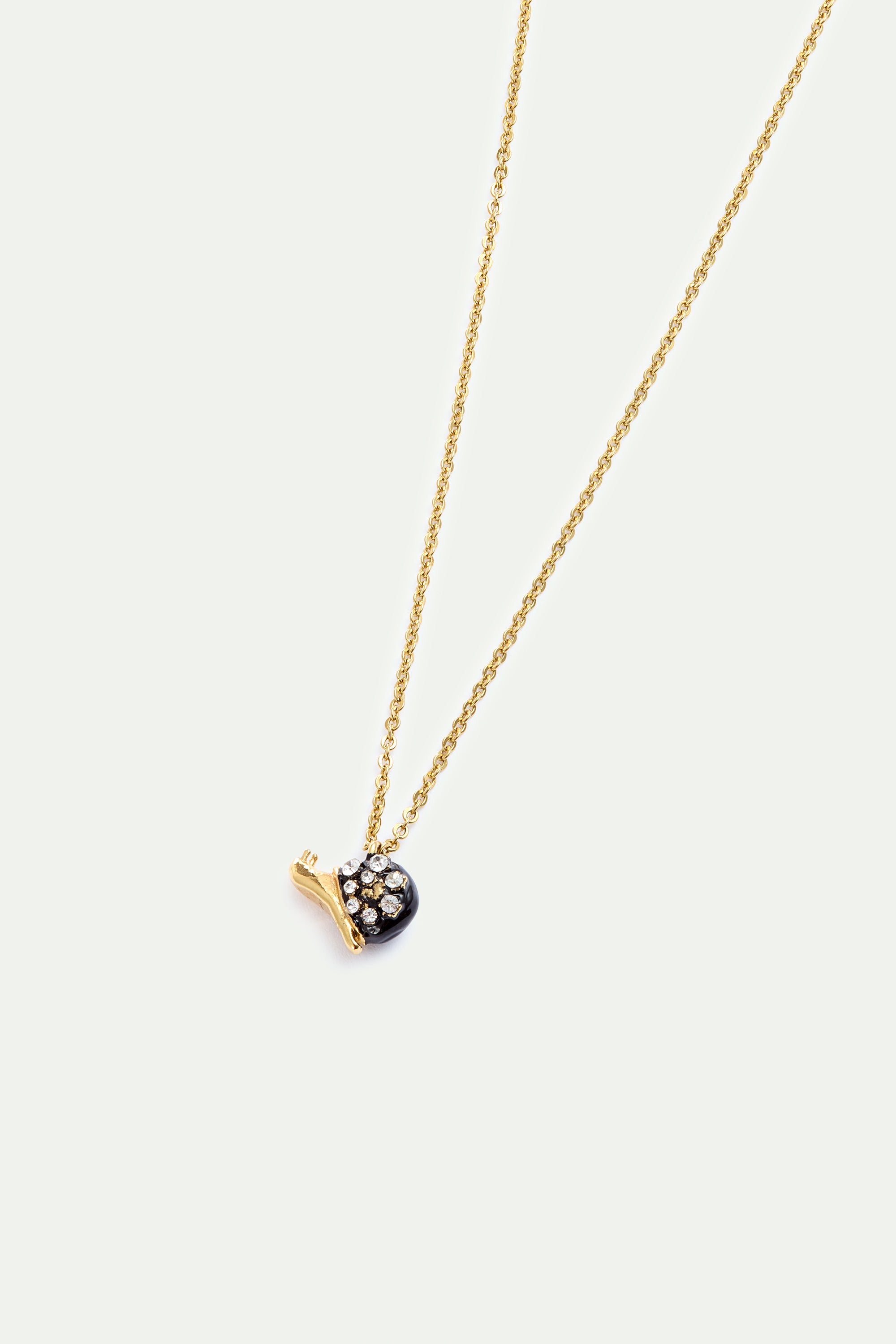 Black and gold snail pendant necklace with crystals